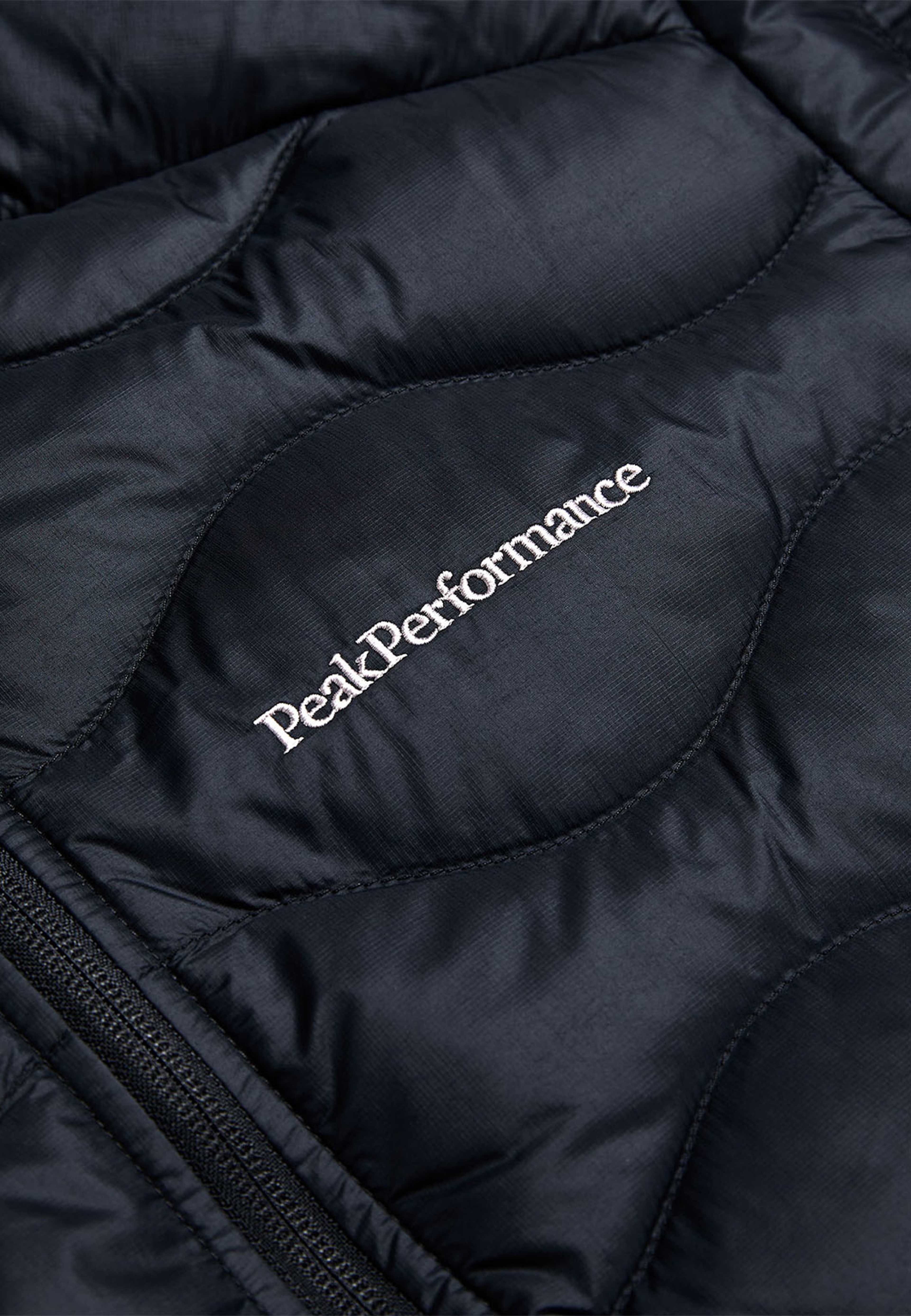 Helium Down Hood Jacket, från Peak Performance, i färgen Black. Klicka för att öppna bilden i stort format