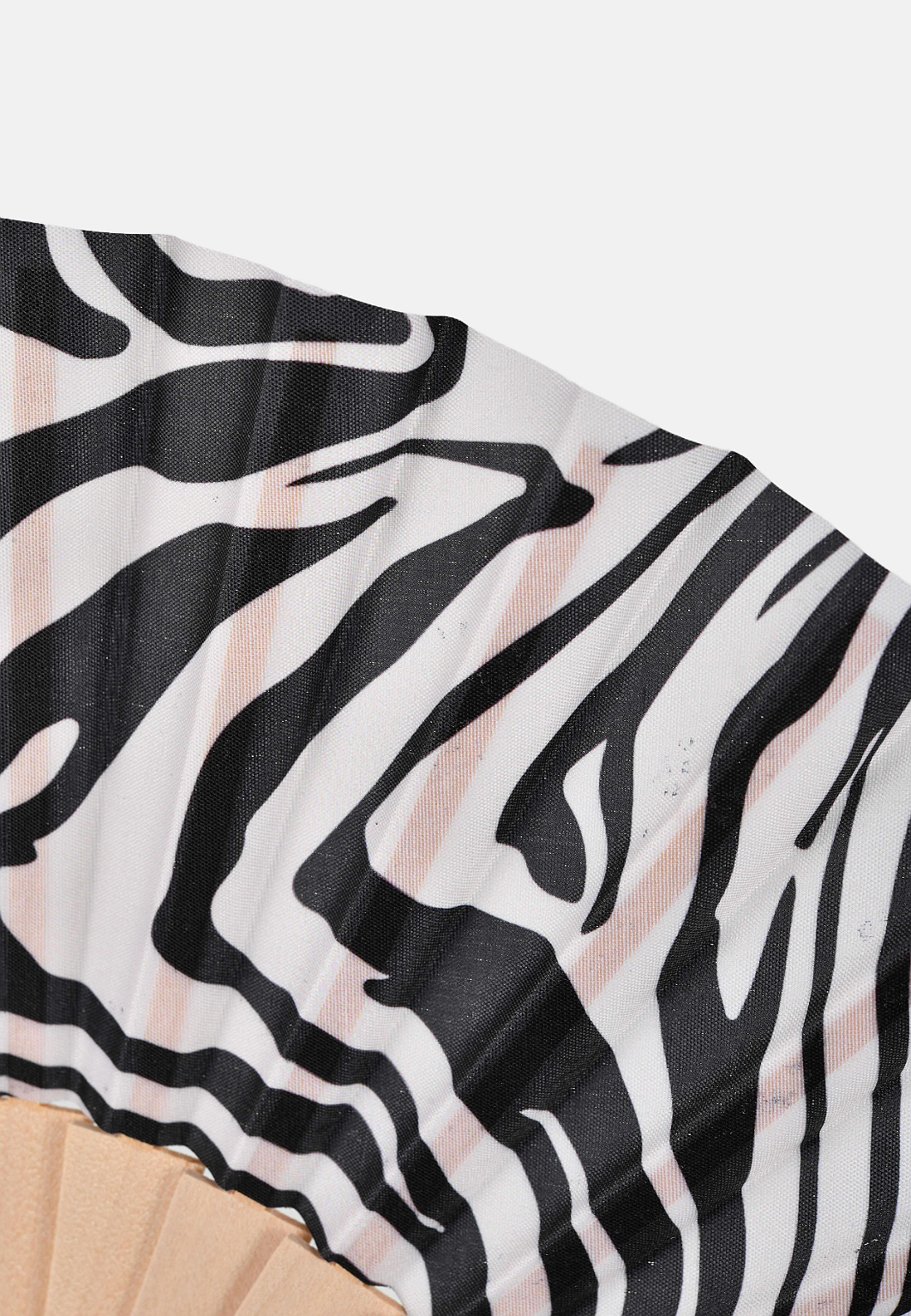 Hopfällbar solfjäder, från Å WOMAN, i färgen Zebra. Klicka för att öppna bilden i stort format