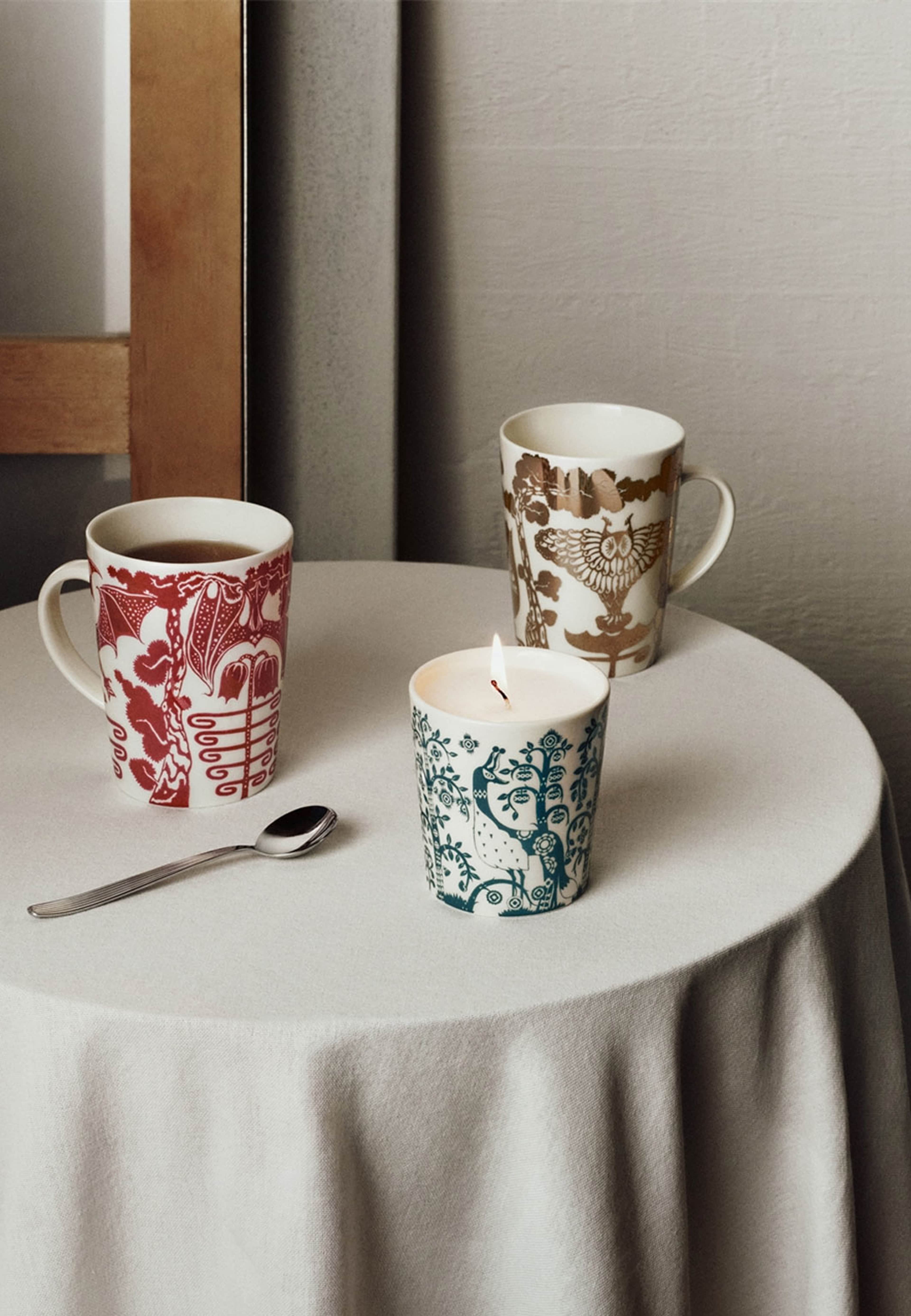 Taika mugg 0,4 L Uni spegel presentförpackning, från Iittala, i färgen Guld. Klicka för att öppna bilden i stort format