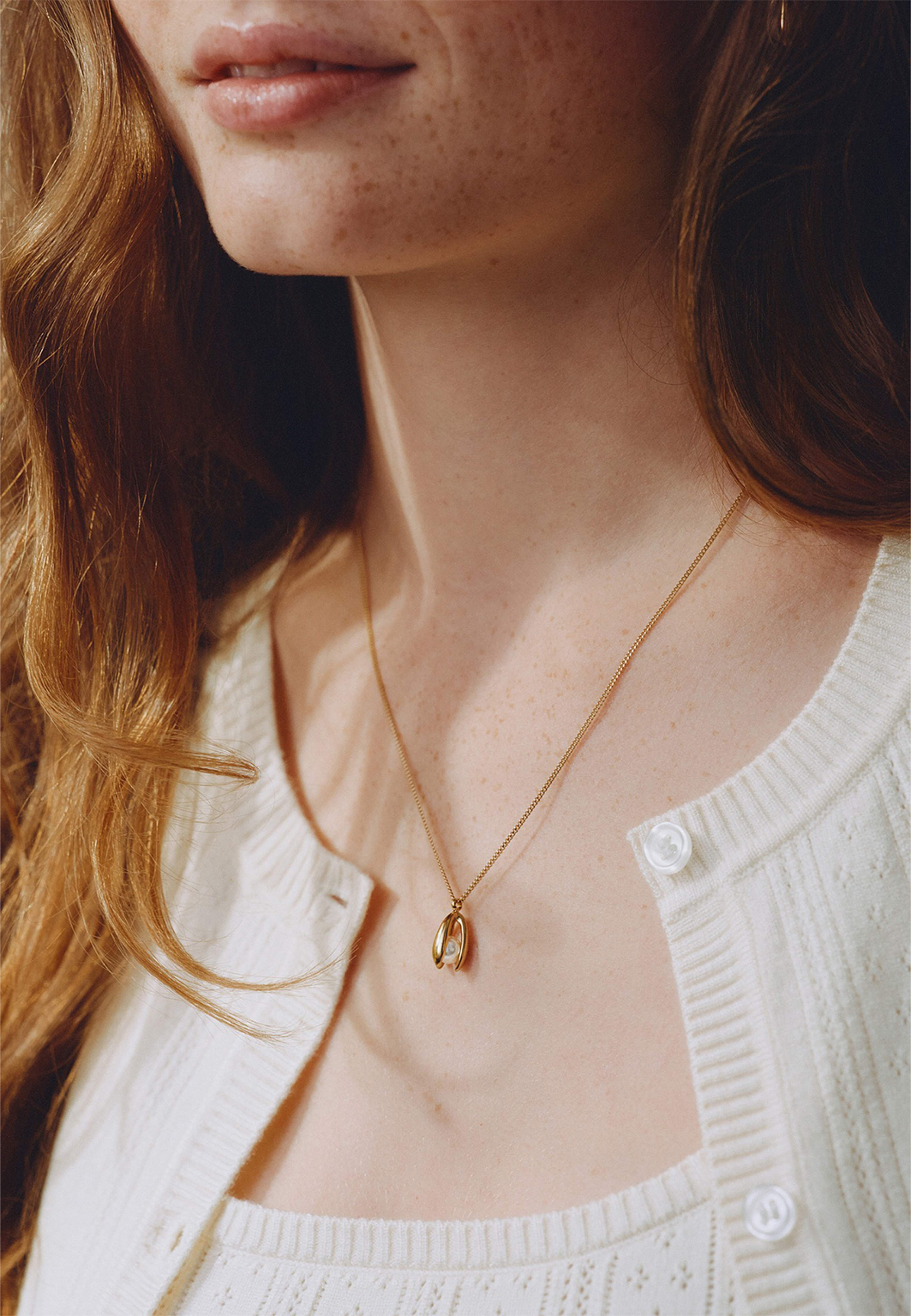 Moonrave Necklace L Gold, från Edblad, i färgen Gold. Klicka för att öppna bilden i stort format