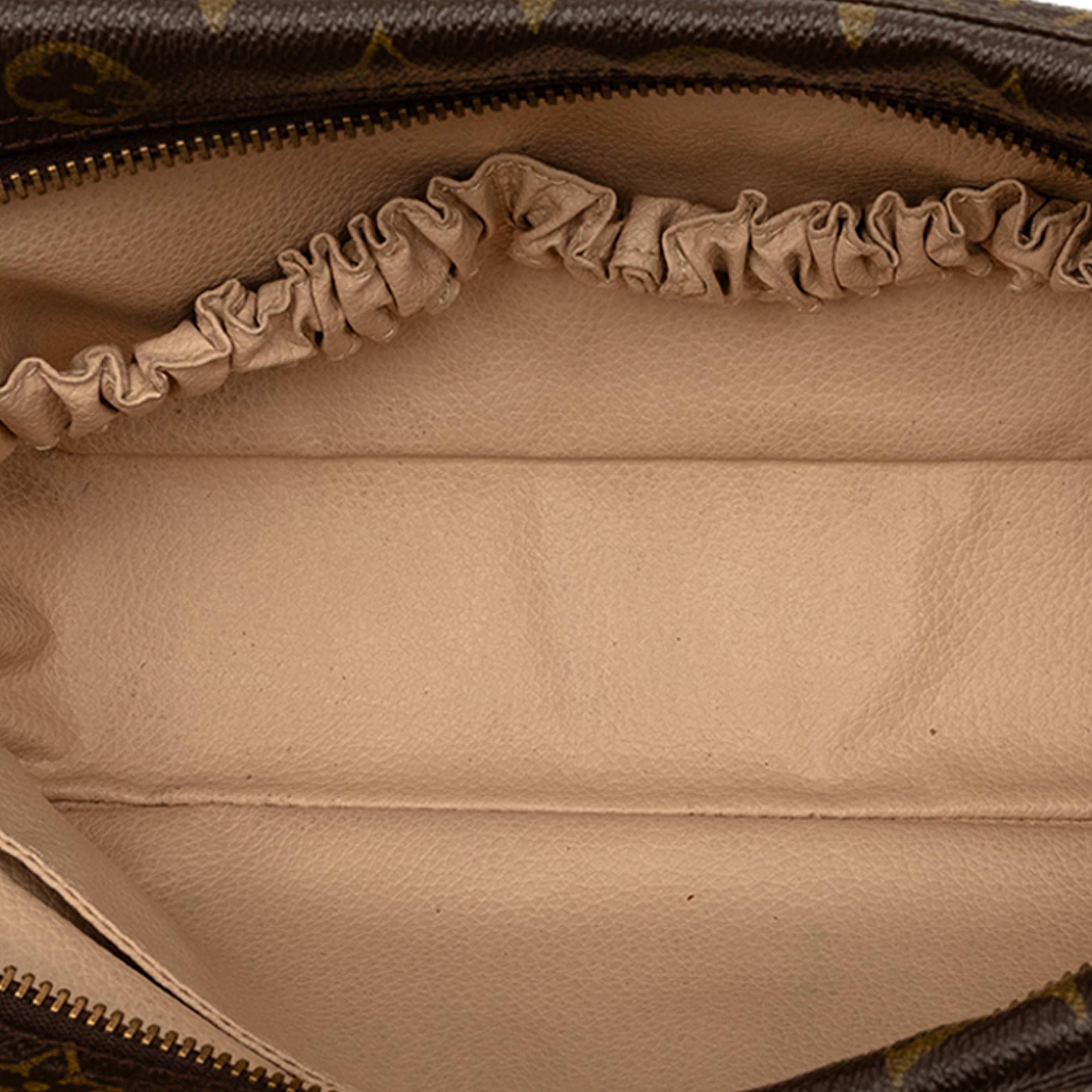 Louis Vuitton Monogram Trousse Toilette 28, från Luxclusif, i färgen brown. Klicka för att öppna bilden i stort format