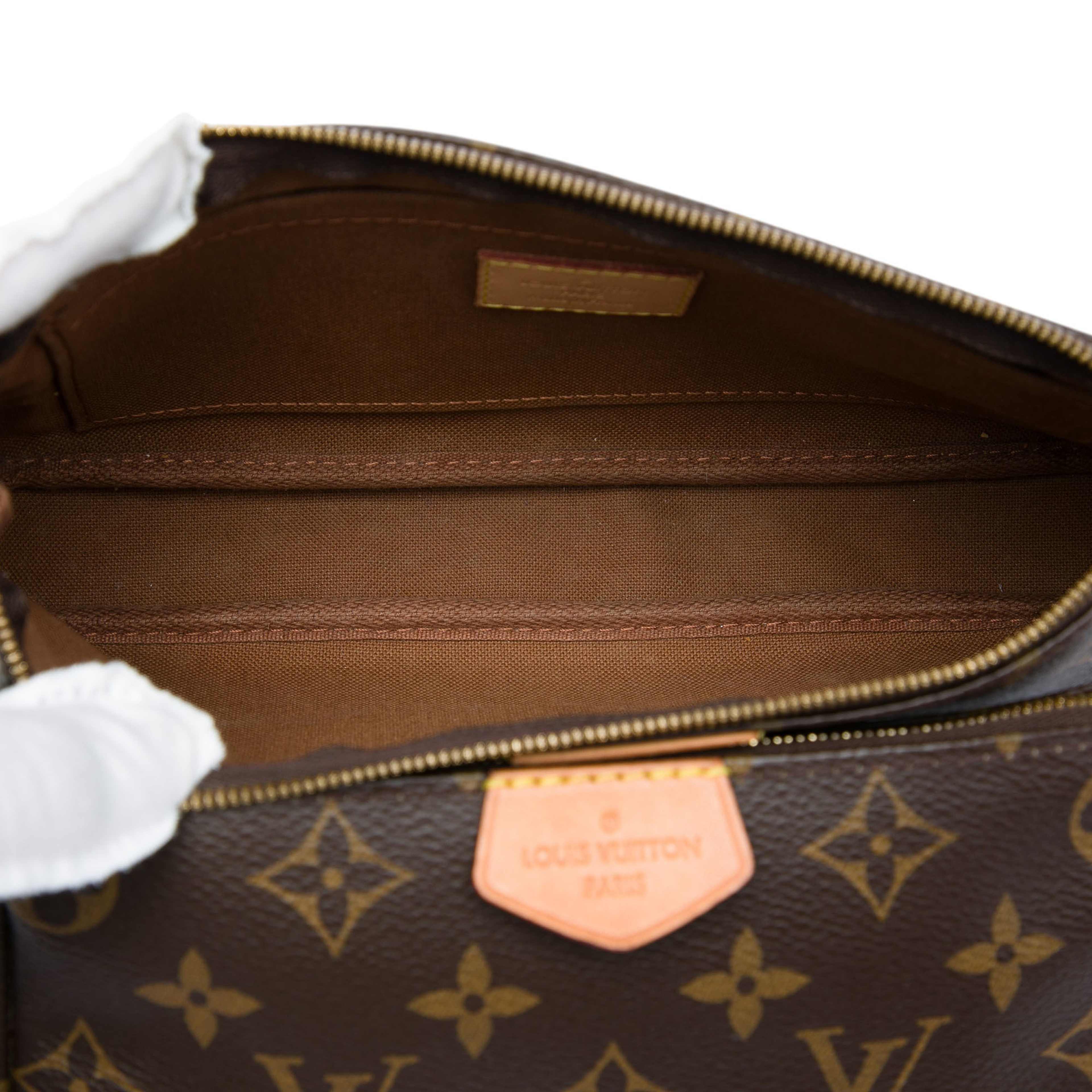 Louis Vuitton Monogram Multi Pochette Accessoires, från Luxclusif, i färgen brun. Klicka för att öppna bilden i stort format