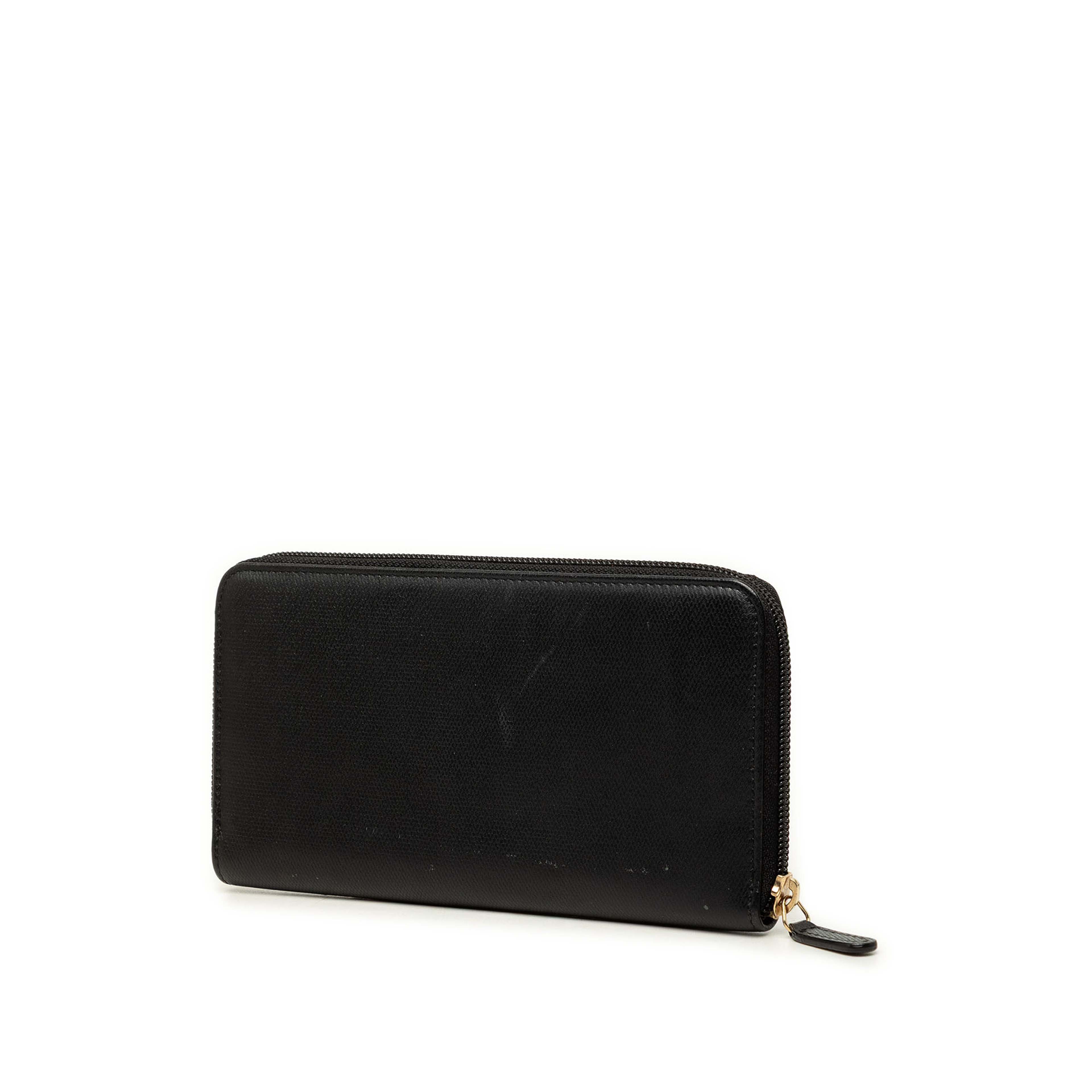Chanel Cc Textured Calfskin Button Zip Around Wallet, från Luxclusif, i färgen svart. Klicka för att öppna bilden i stort format