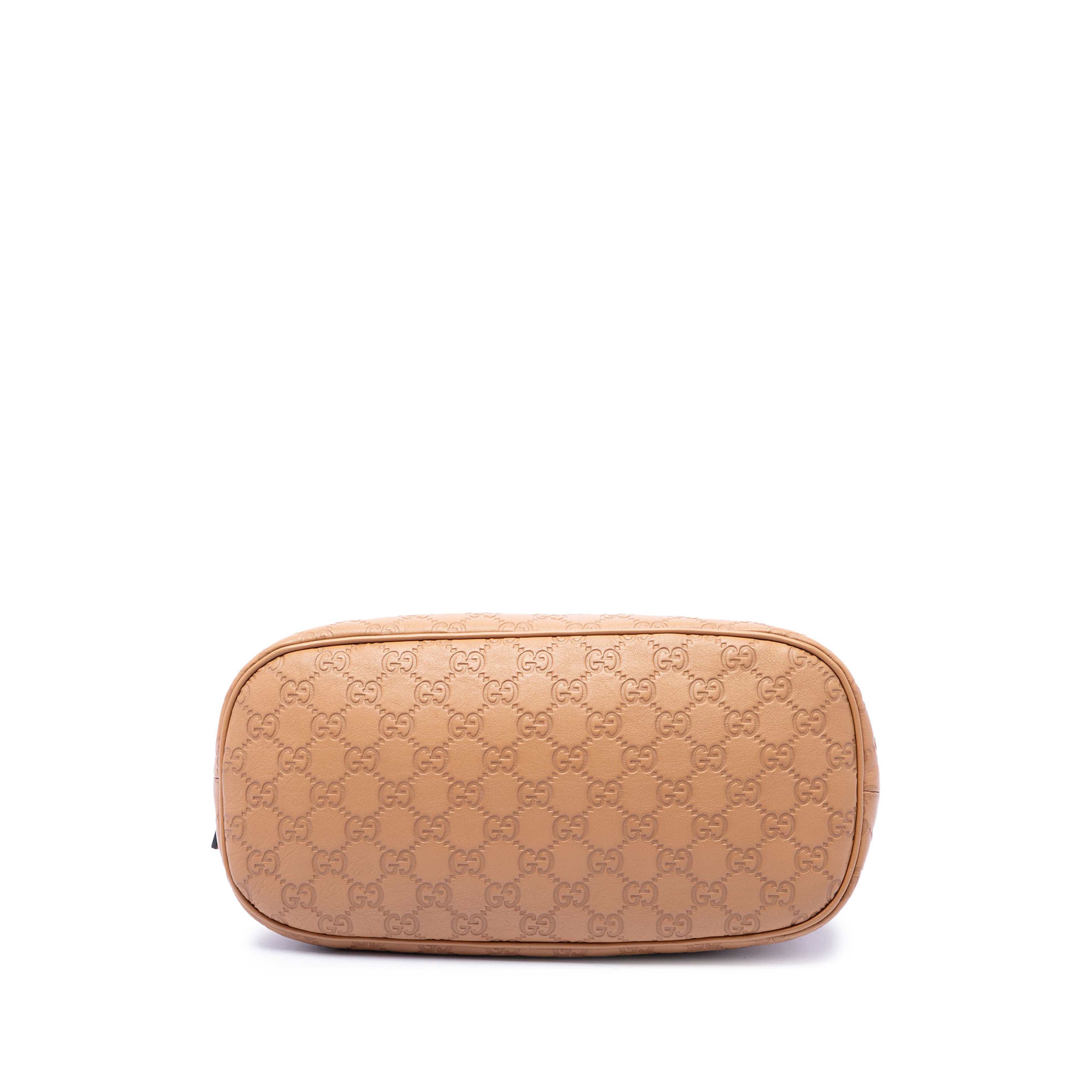 Gucci Medium Guccissima Dome Satchel, från Luxclusif, i färgen brun. Klicka för att öppna bilden i stort format