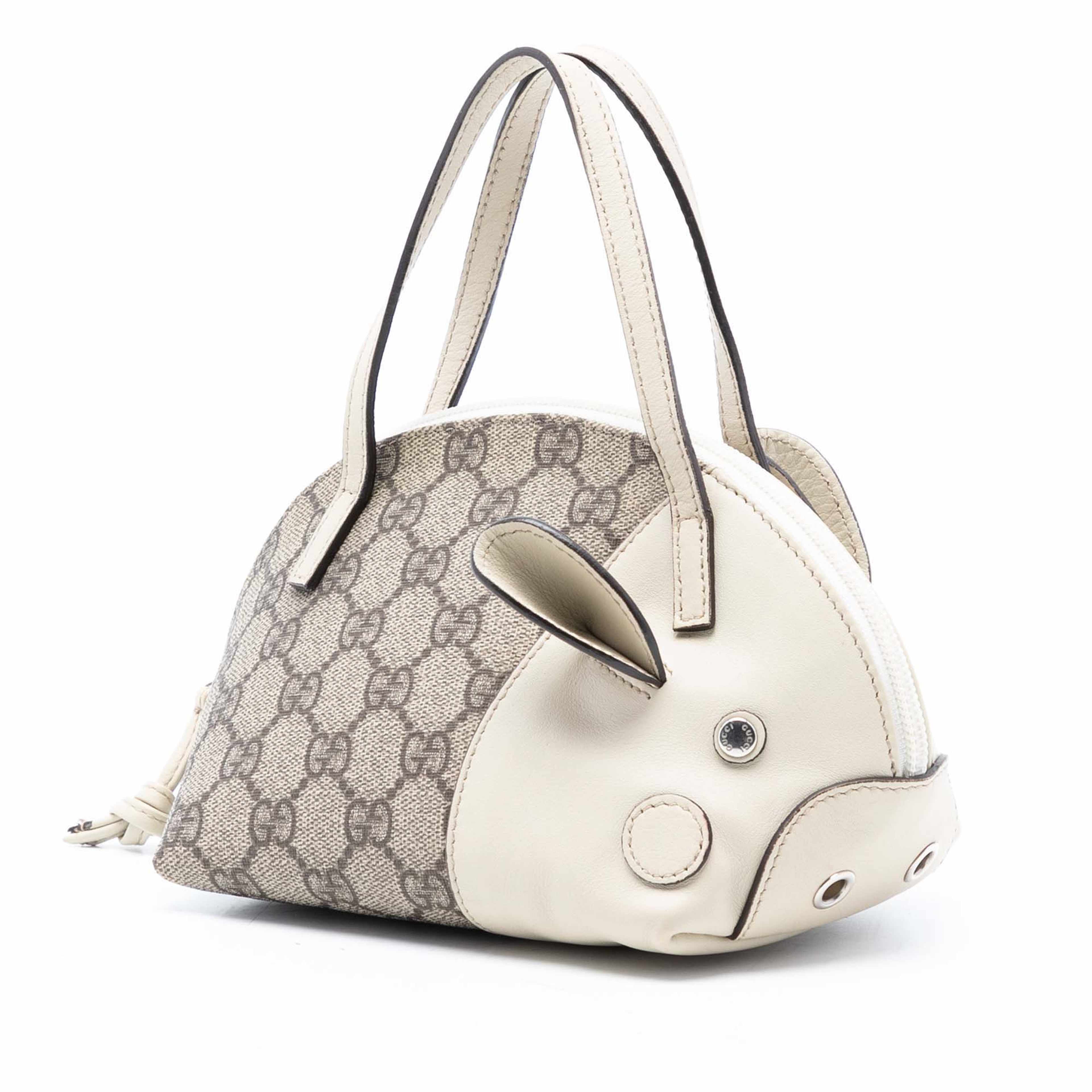 Gucci Gg Supreme Zoo Handbag, från Luxclusif, i färgen beige. Klicka för att öppna bilden i stort format