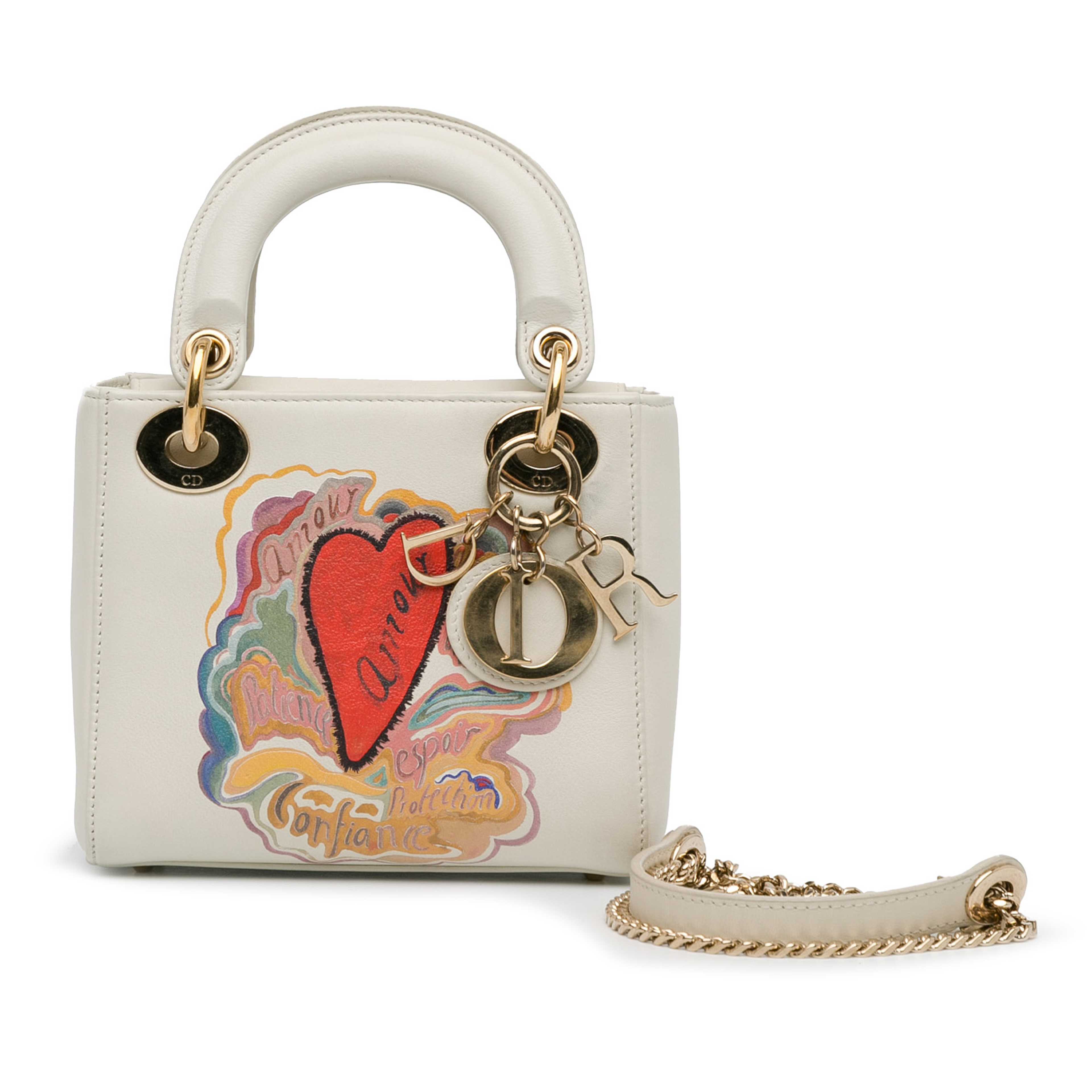 Dior Dioramour Niki De Saint Phalle Mini Calfskin Lady Dior, från Luxclusif, i färgen vit. Klicka för att öppna bilden i stort format