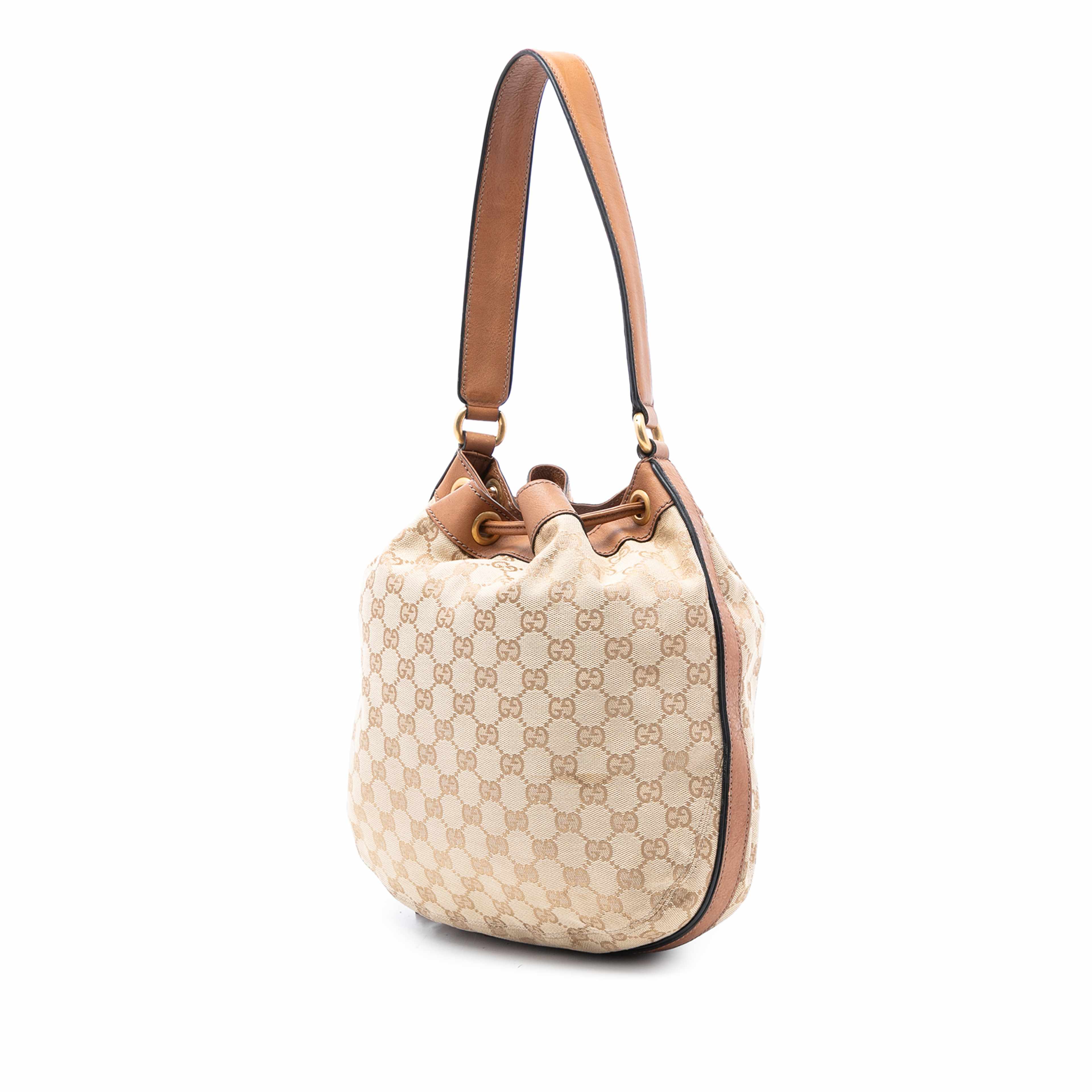 Gucci Gg Canvas Web Rania Drawstring Hobo, från Luxclusif, i färgen beige. Klicka för att öppna bilden i stort format