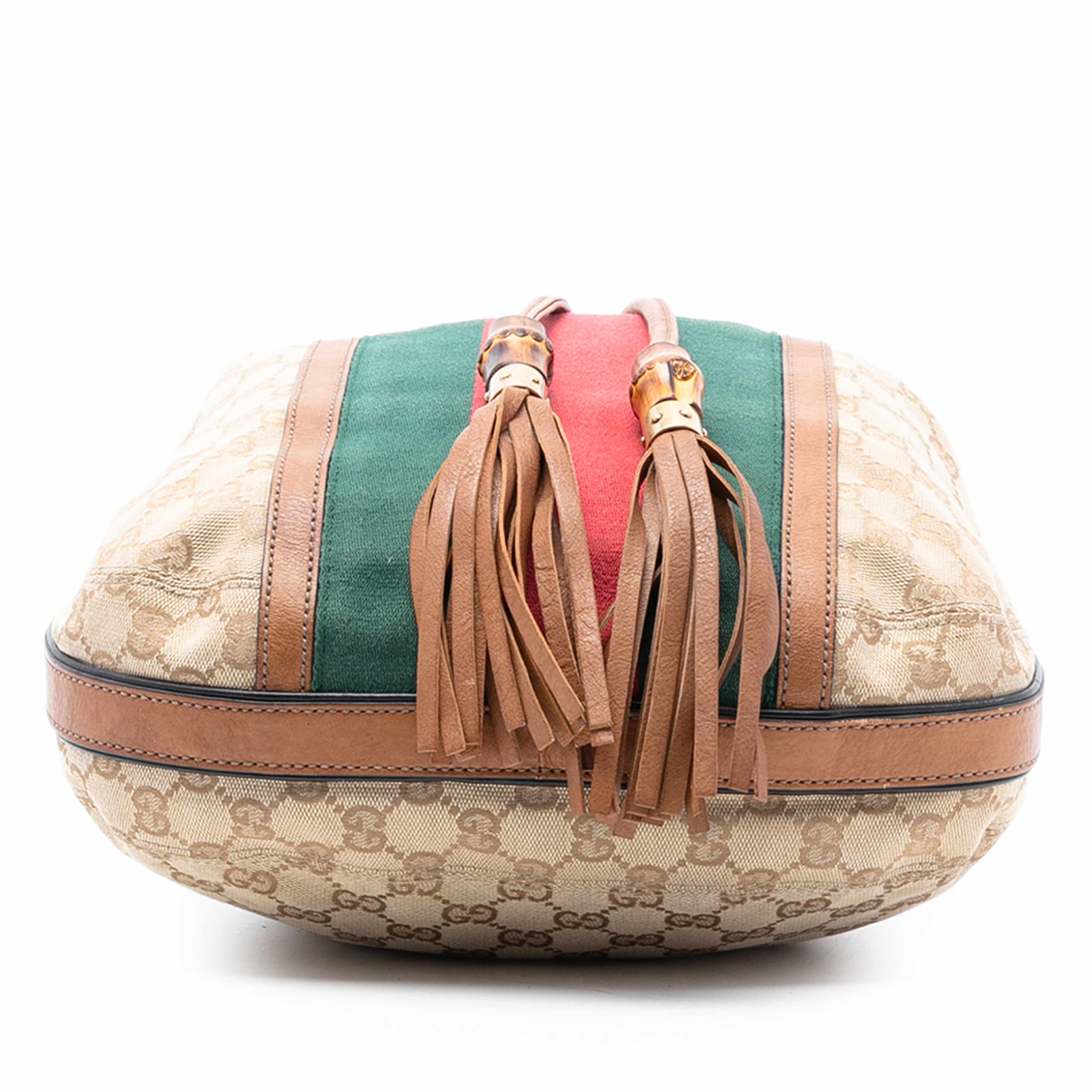 Gucci Gg Canvas Web Rania Drawstring Hobo, från Luxclusif, i färgen beige. Klicka för att öppna bilden i stort format