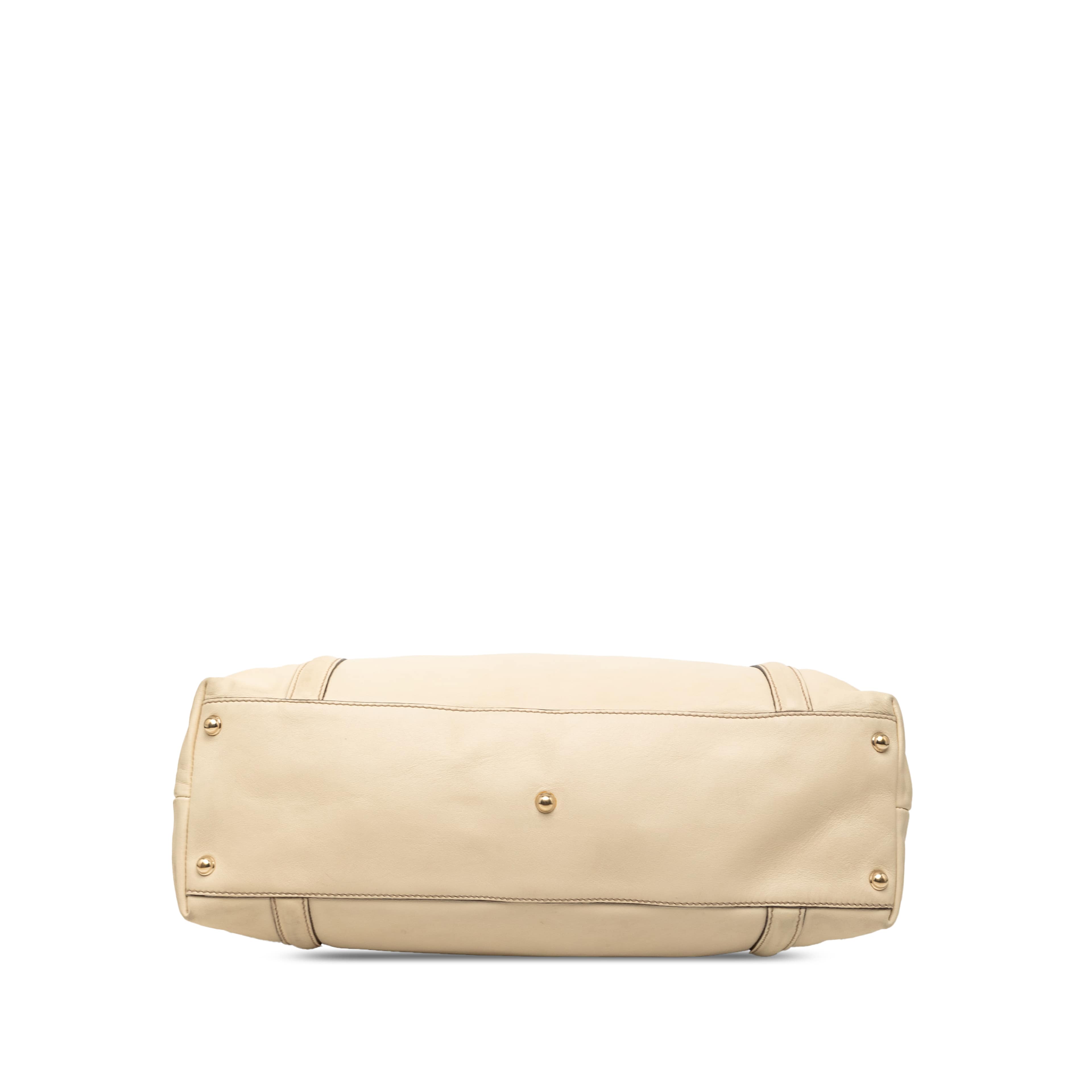 Gucci Calfskin Dialux Britt Tote, från Luxclusif, i färgen brun. Klicka för att öppna bilden i stort format