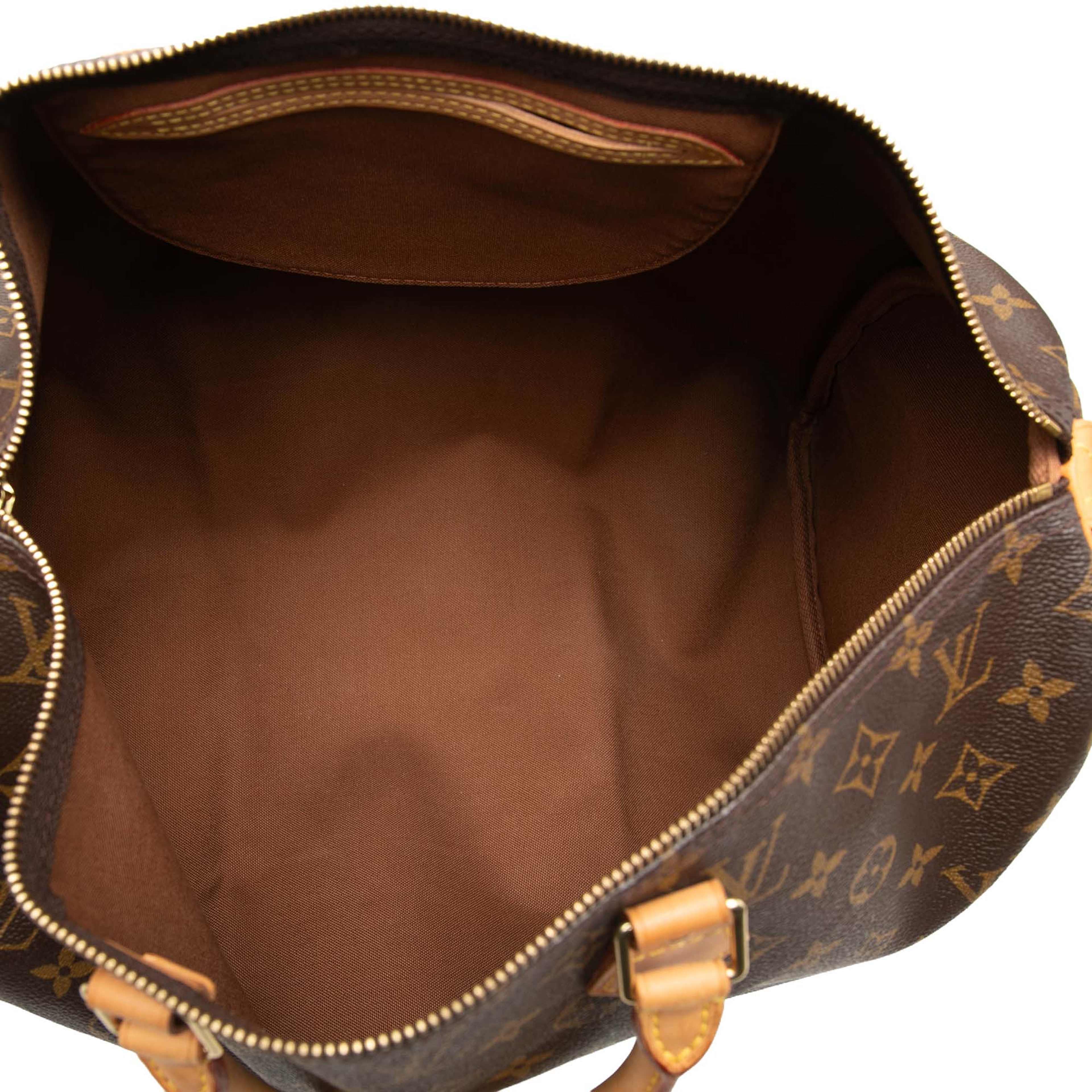 Louis Vuitton Monogram Speedy 40, från Luxclusif, i färgen brun. Klicka för att öppna bilden i stort format