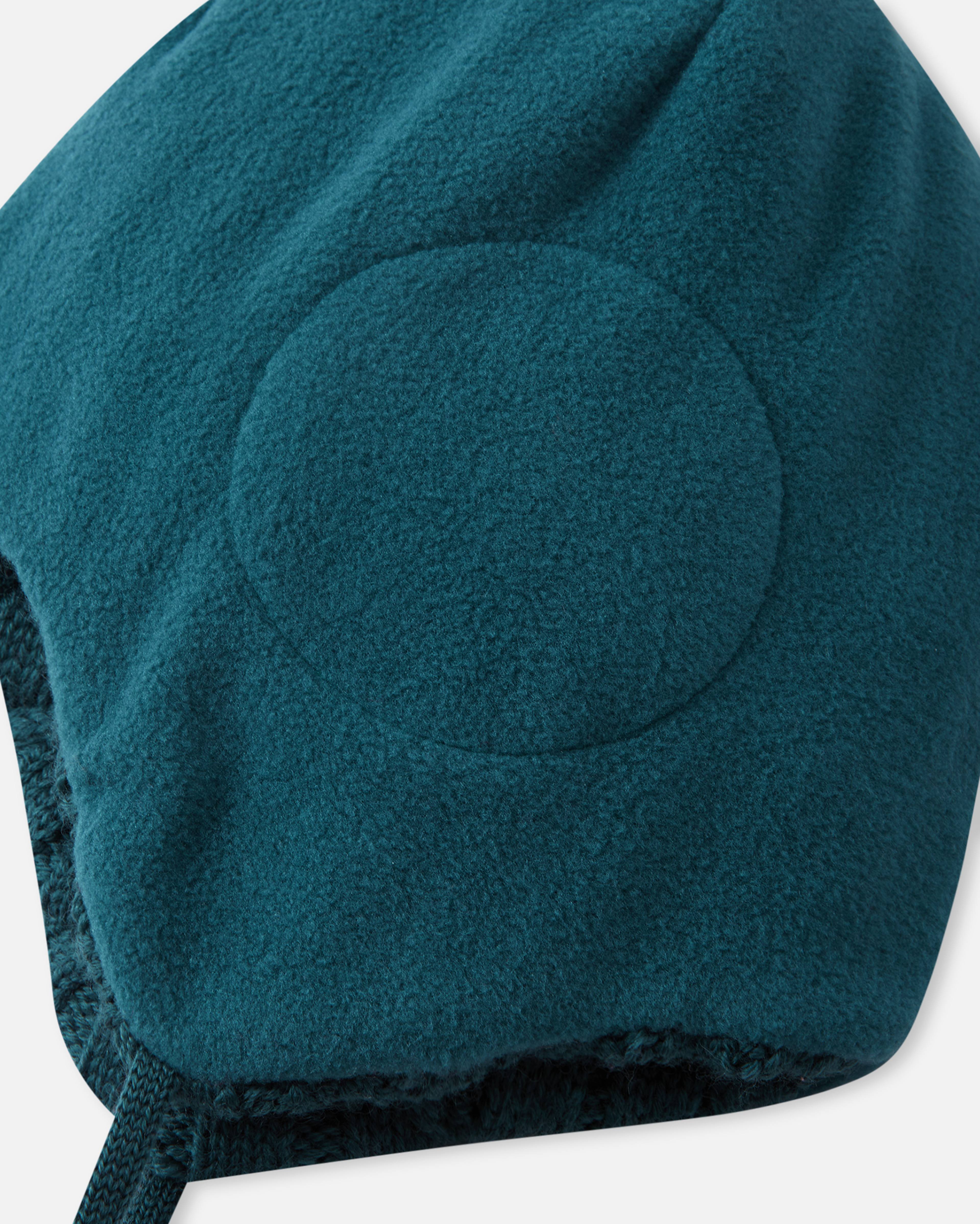 Mössa Nunavut, från Reima, i färgen dark teal. Klicka för att öppna bilden i stort format
