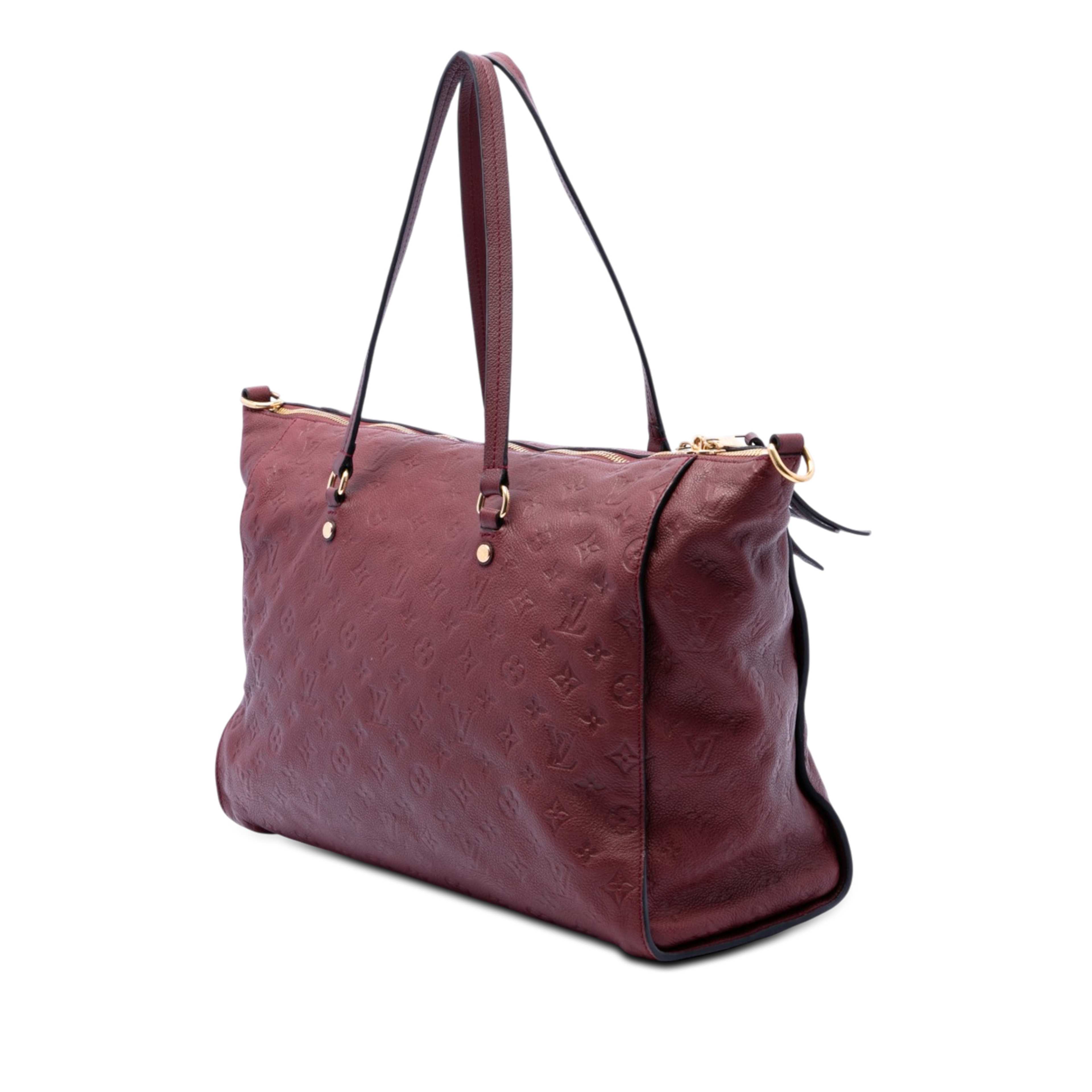 Louis Vuitton Monogram Empreinte Lumineuse Gm, från Luxclusif, i färgen bordeaux. Klicka för att öppna bilden i stort format