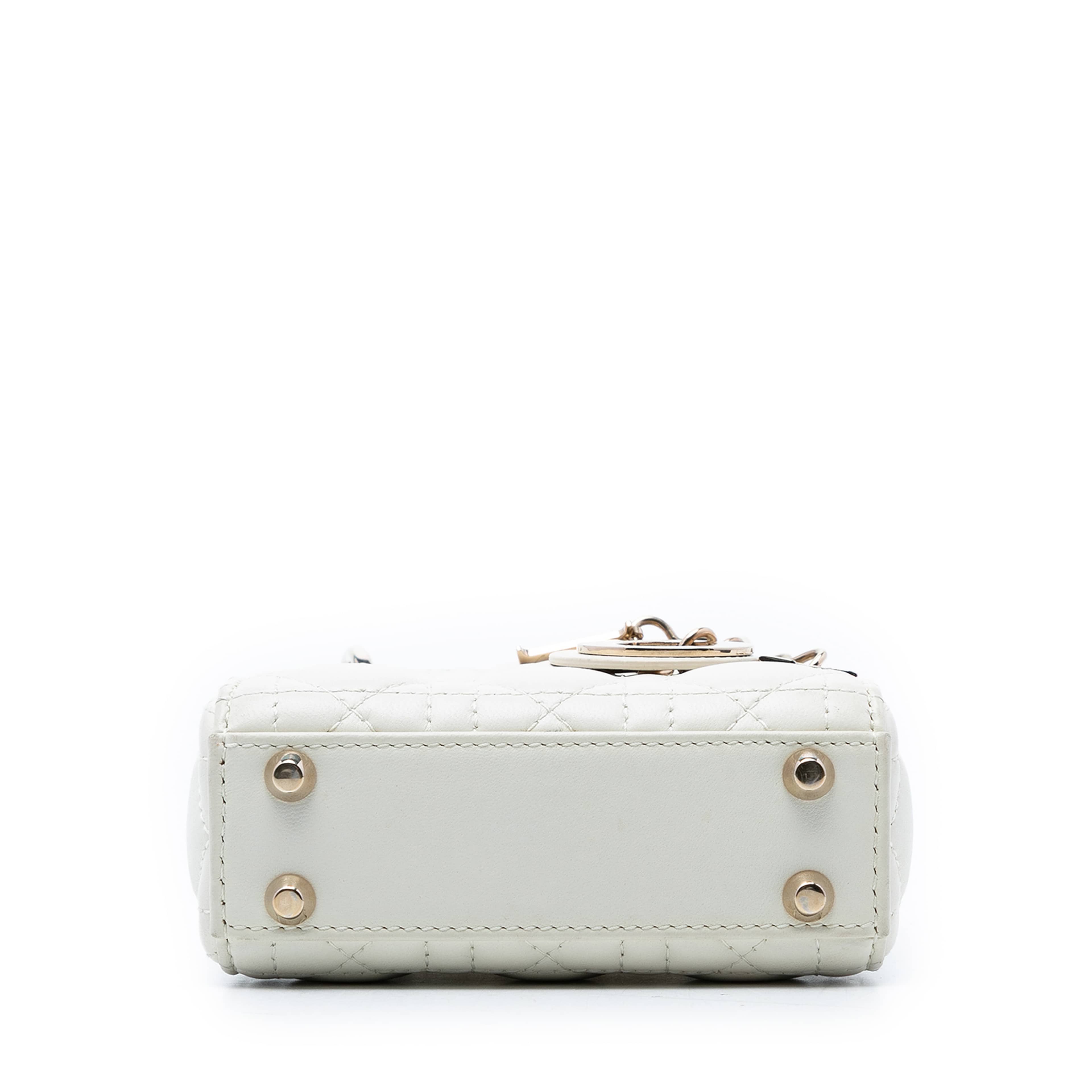 Dior Micro Lambskin Cannage Lady Dior, från Luxclusif, i färgen vit. Klicka för att öppna bilden i stort format