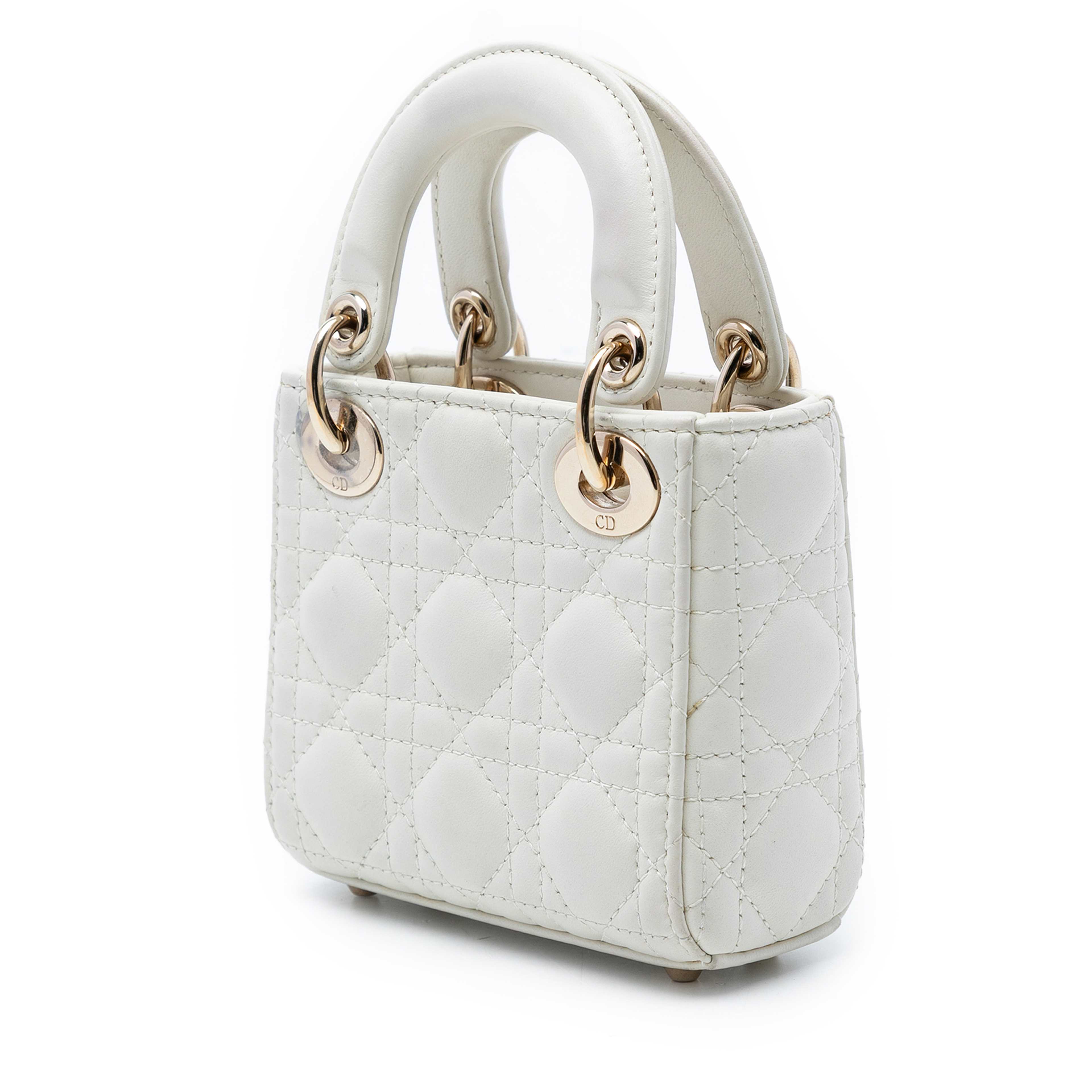 Dior Micro Lambskin Cannage Lady Dior, från Luxclusif, i färgen vit. Klicka för att öppna bilden i stort format