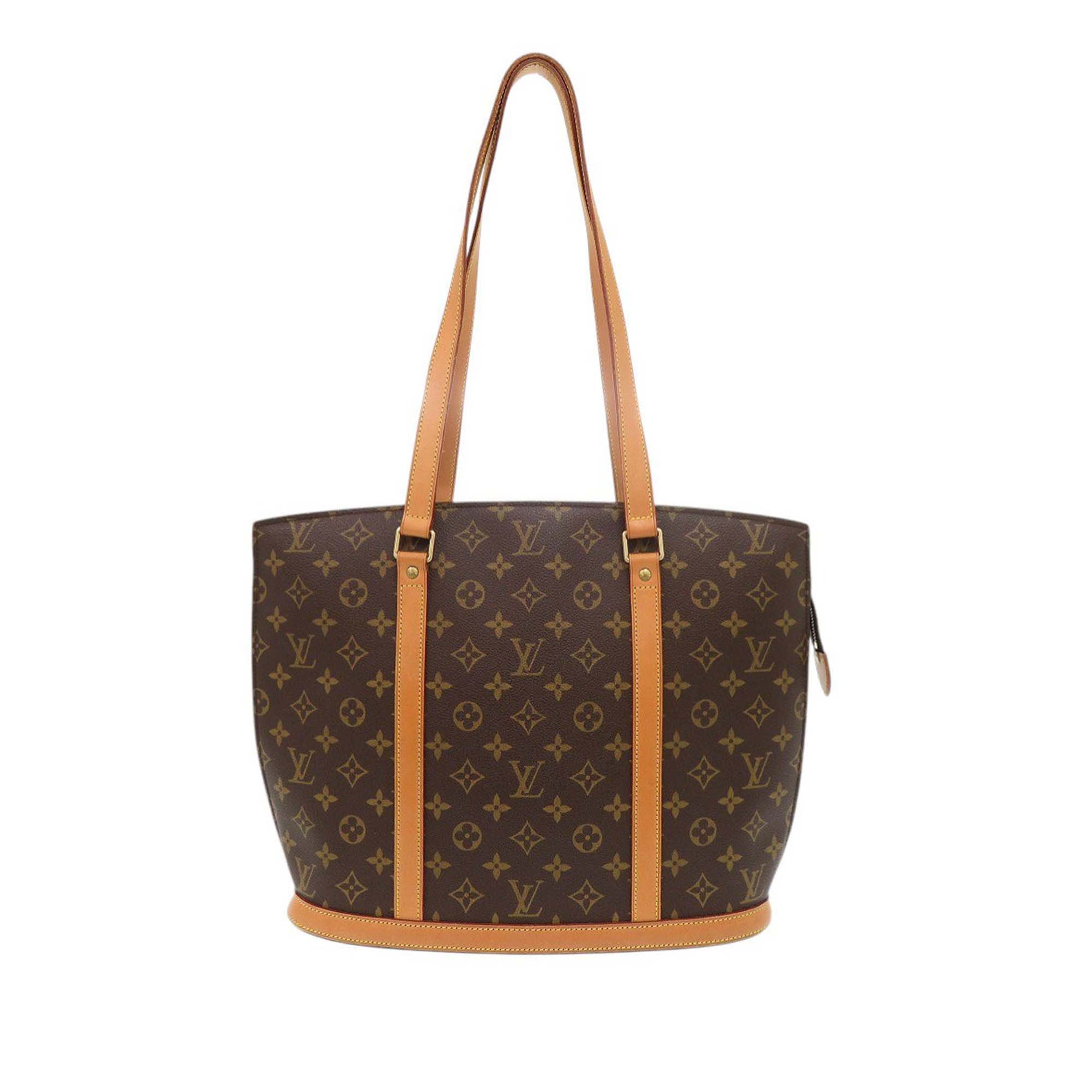 Louis Vuitton Monogram Babylone, från Luxclusif, i färgen brun. Klicka för att öppna bilden i stort format