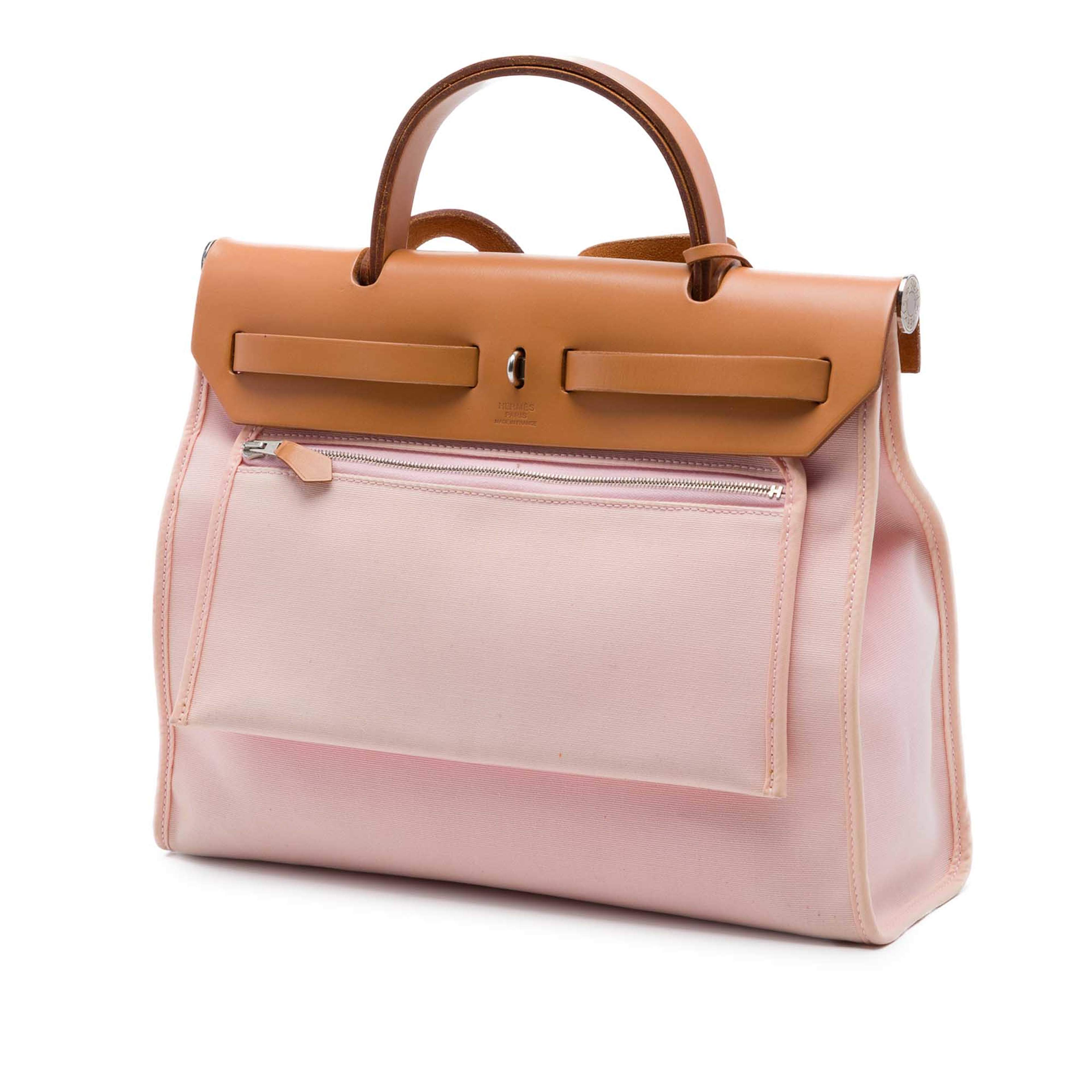 Hermès Toile Herbag Zip 31, från Luxclusif, i färgen rosa. Klicka för att öppna bilden i stort format