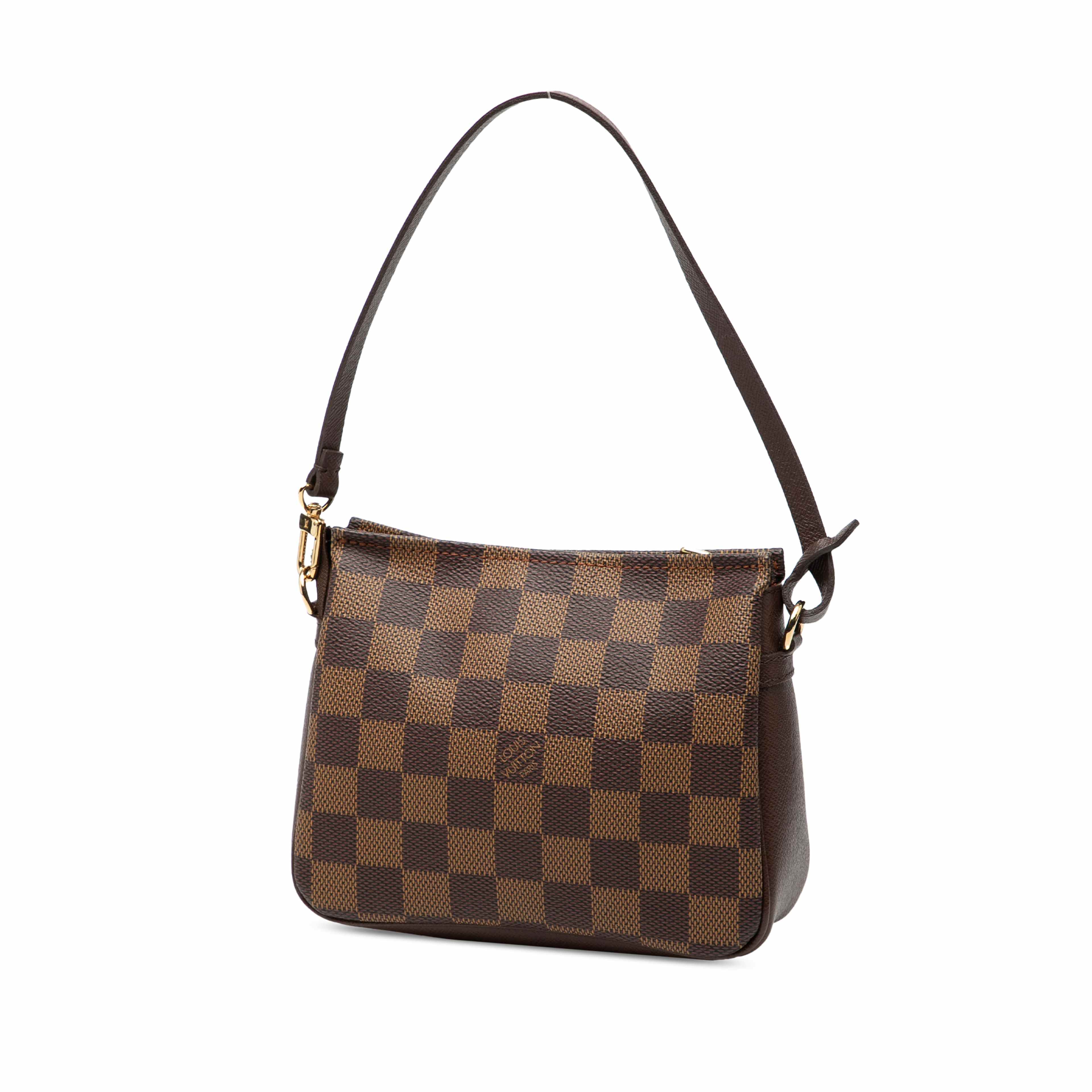 Louis Vuitton Damier Ebene Trousse Pochette, från Luxclusif, i färgen brun. Klicka för att öppna bilden i stort format