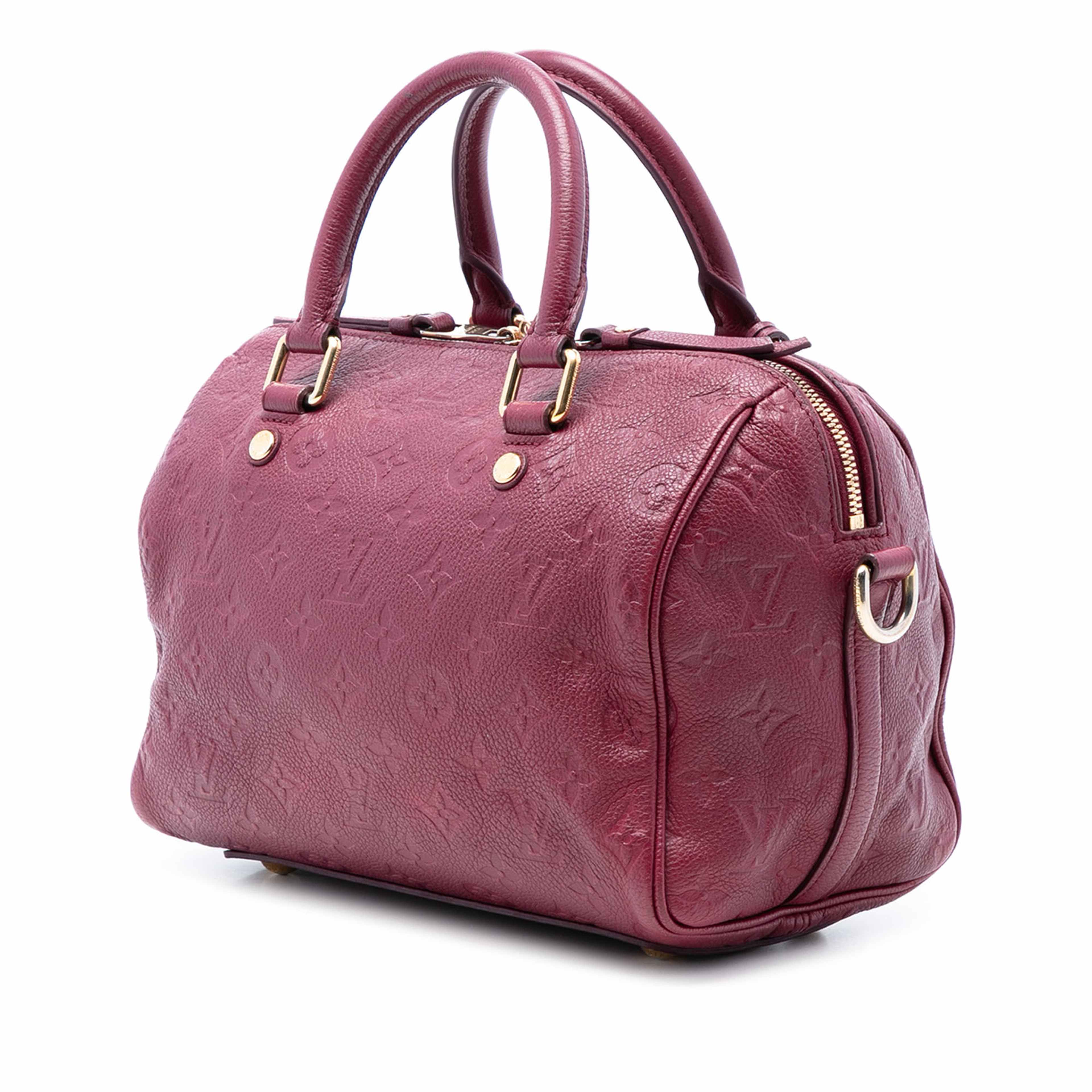 Louis Vuitton Monogram Empreinte Speedy Bandouliere 25, från Luxclusif, i färgen red. Klicka för att öppna bilden i stort format