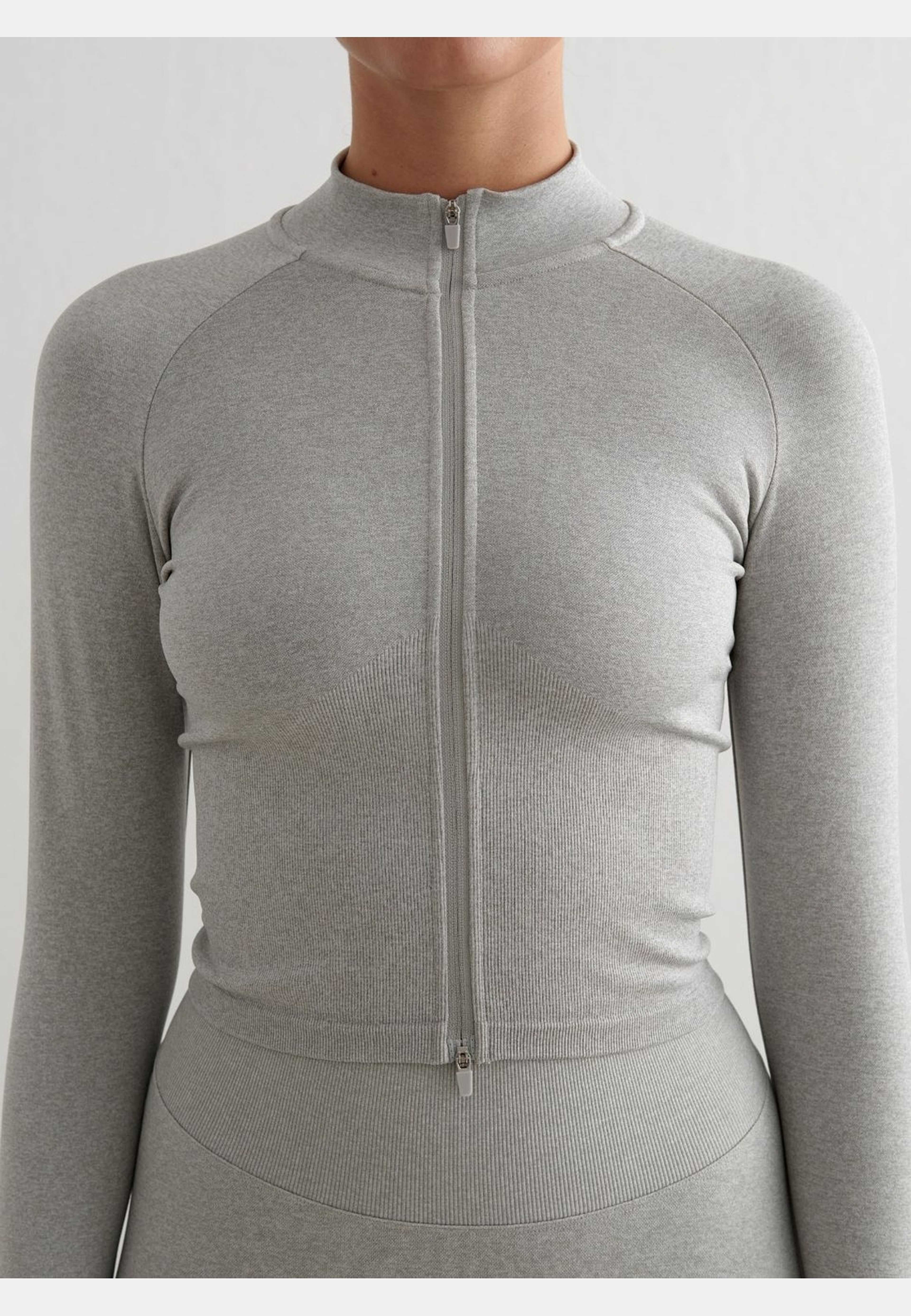 Shape Seamless Zip Jacket, från aim'n, i färgen grey melange. Klicka för att öppna bilden i stort format