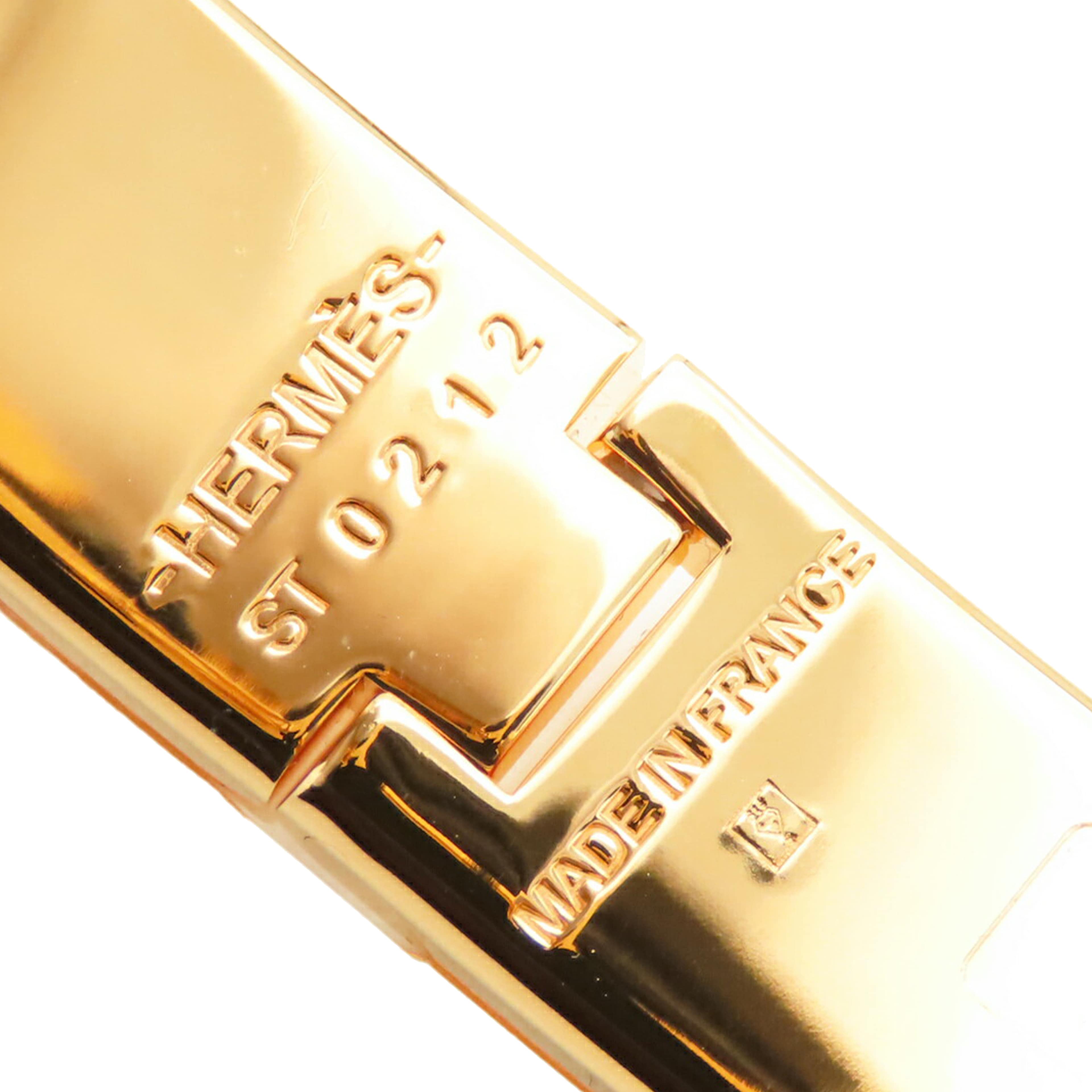 Hermès Enamel Clic H Bracelet Pm, från Luxclusif, i färgen orange. Klicka för att öppna bilden i stort format