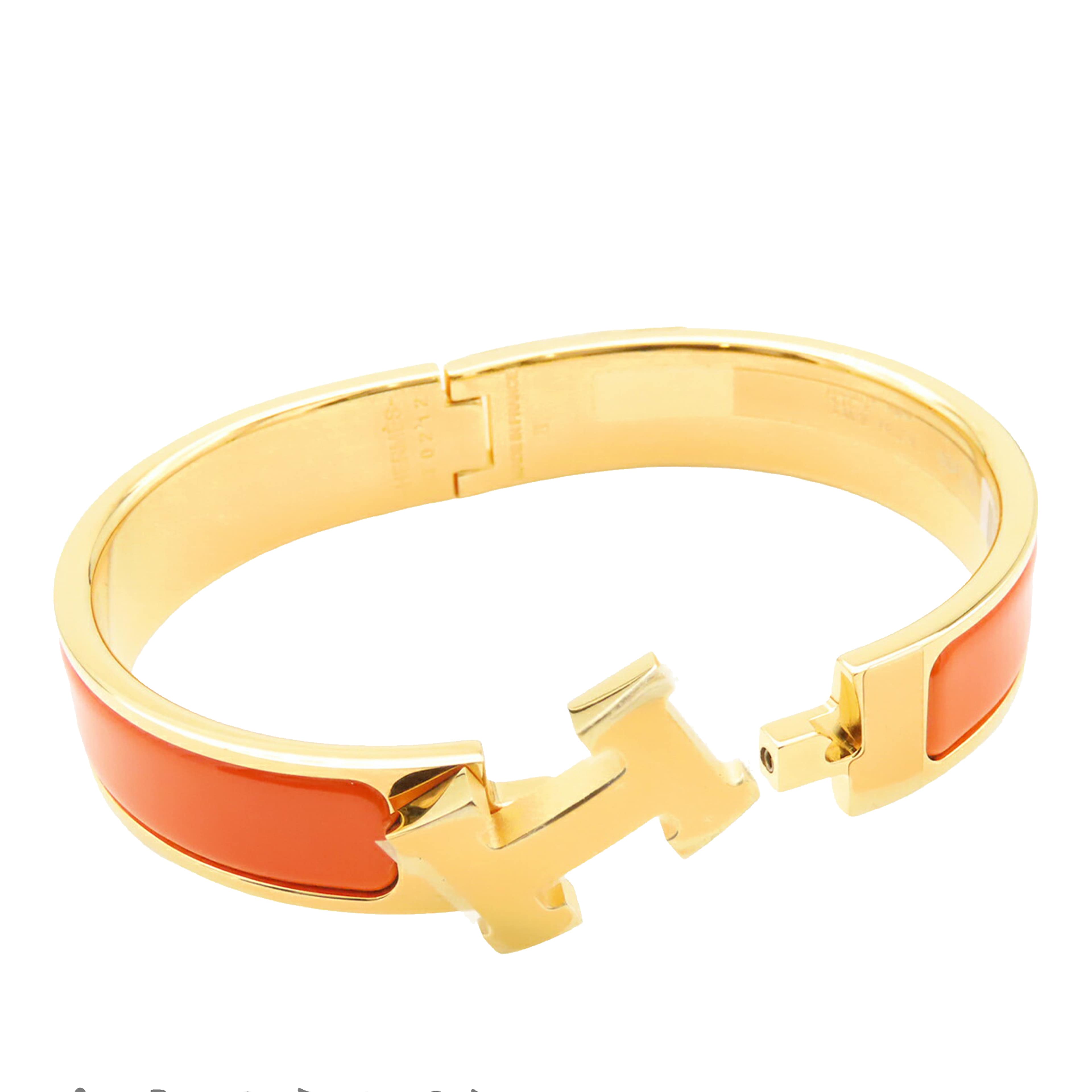 Hermès Enamel Clic H Bracelet Pm, från Luxclusif, i färgen orange. Klicka för att öppna bilden i stort format
