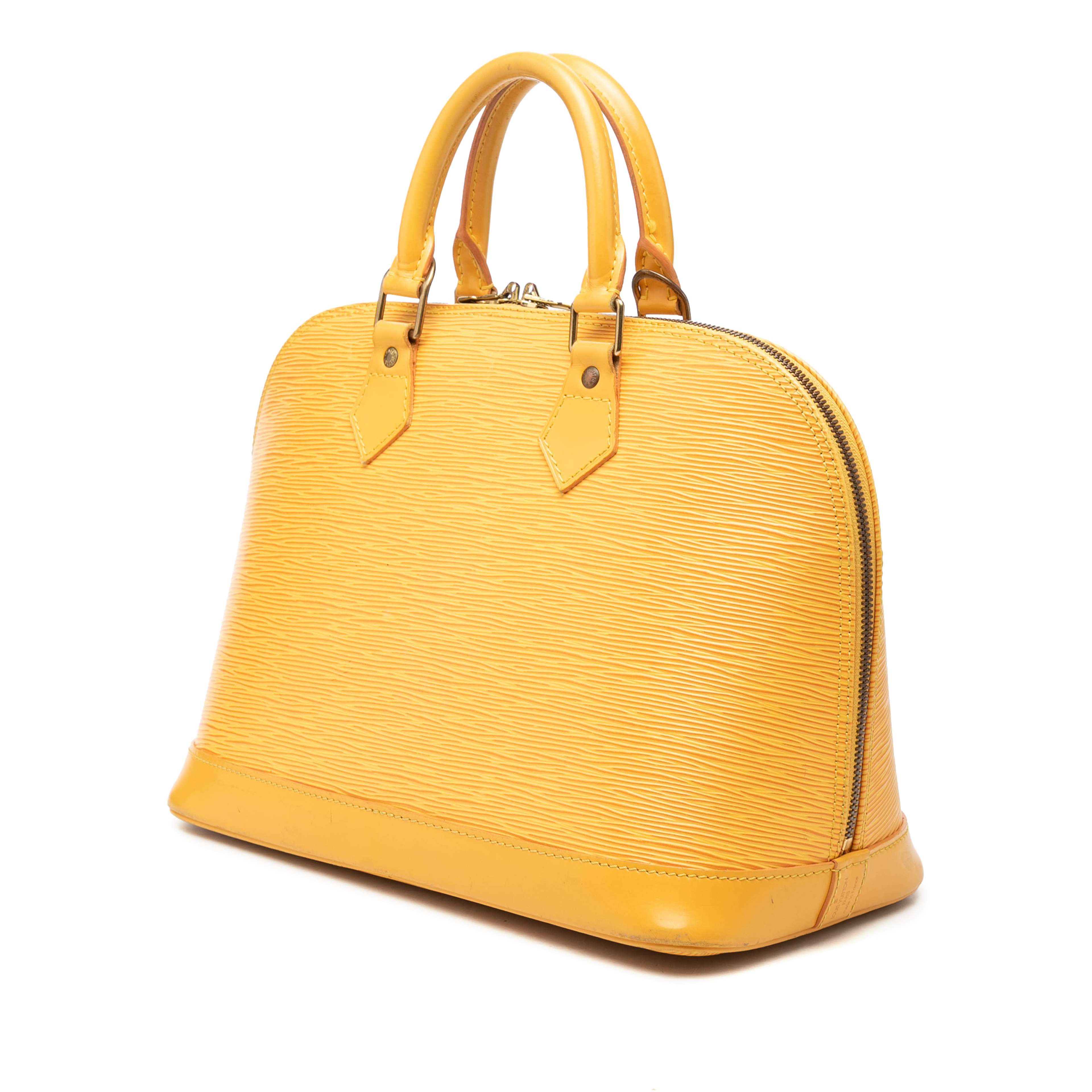 Louis Vuitton Epi Alma Pm, från Luxclusif, i färgen gul. Klicka för att öppna bilden i stort format
