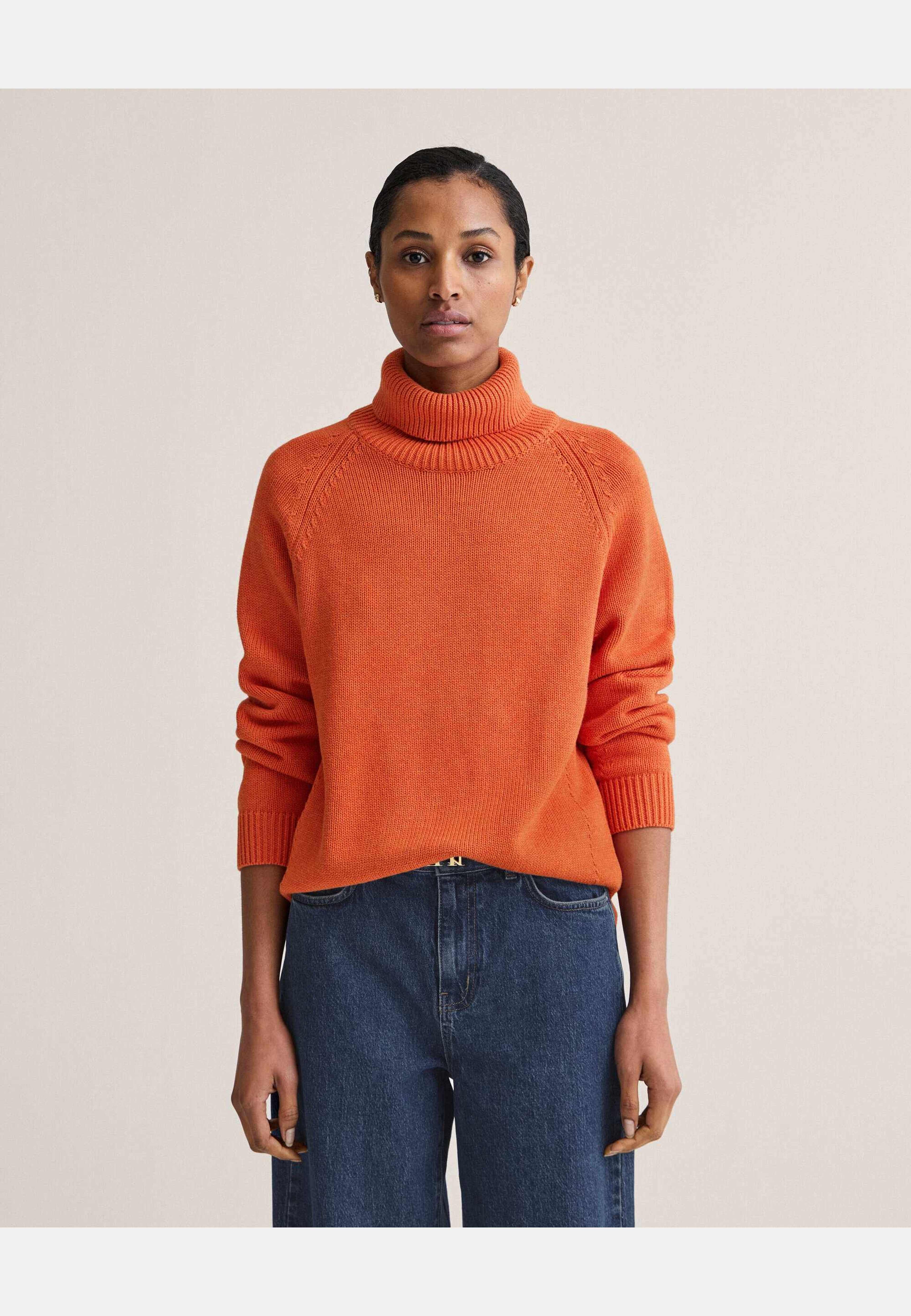 Iris Knitted Turtleneck, från Newhouse, i färgen orange. Klicka för att öppna bilden i stort format
