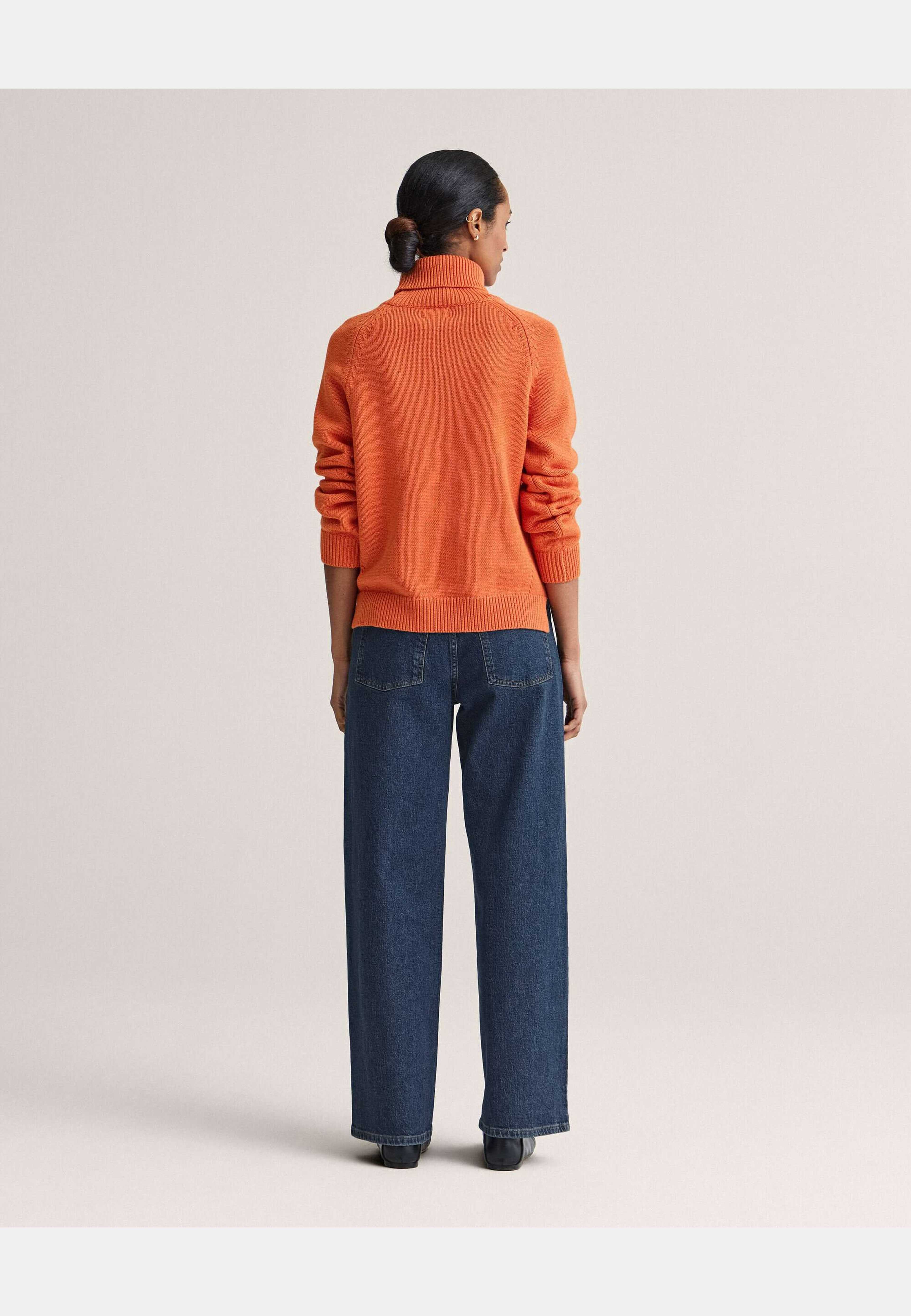 Iris Knitted Turtleneck, från Newhouse, i färgen orange. Klicka för att öppna bilden i stort format