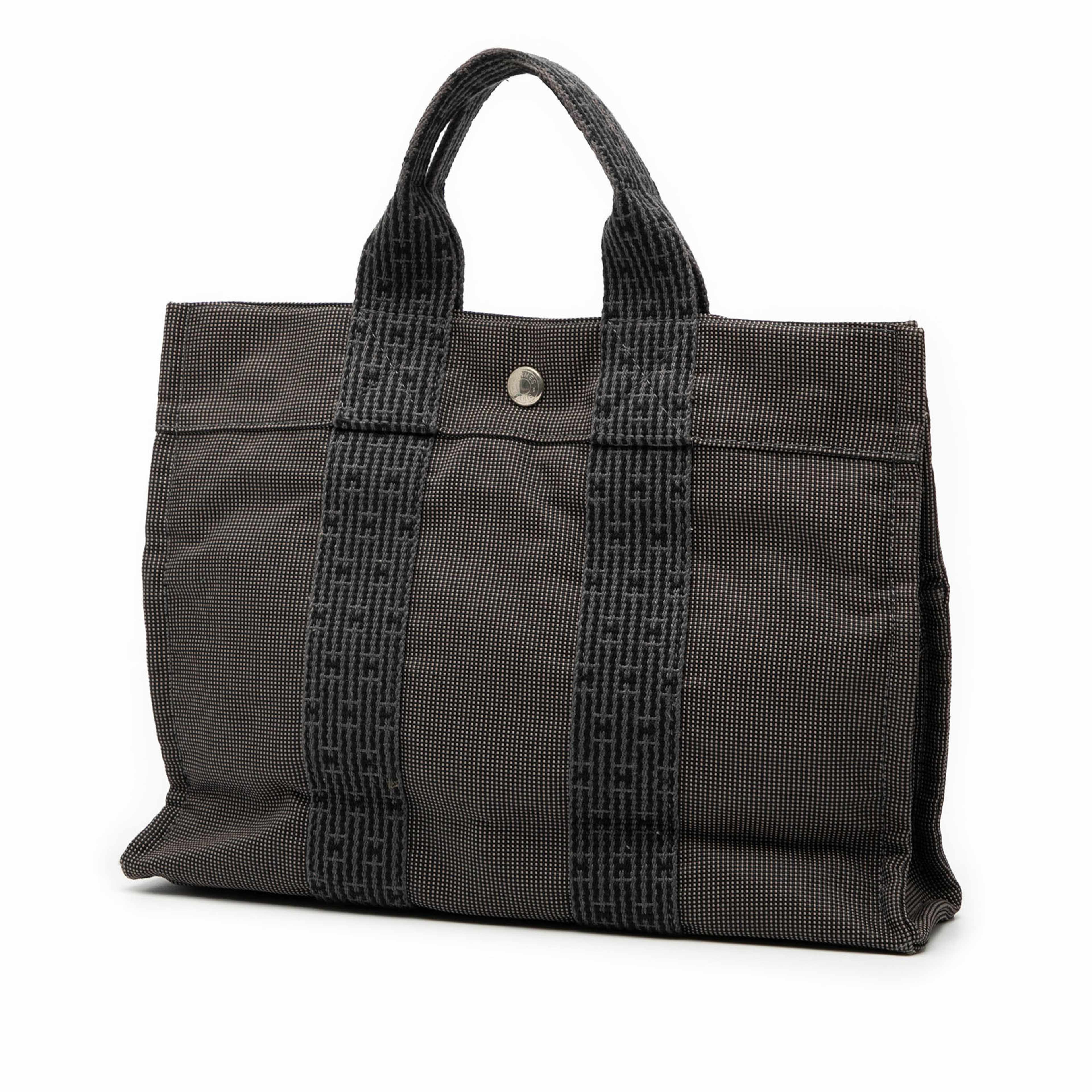Hermès Canvas Herline Pm, från Luxclusif, i färgen dark gray. Klicka för att öppna bilden i stort format