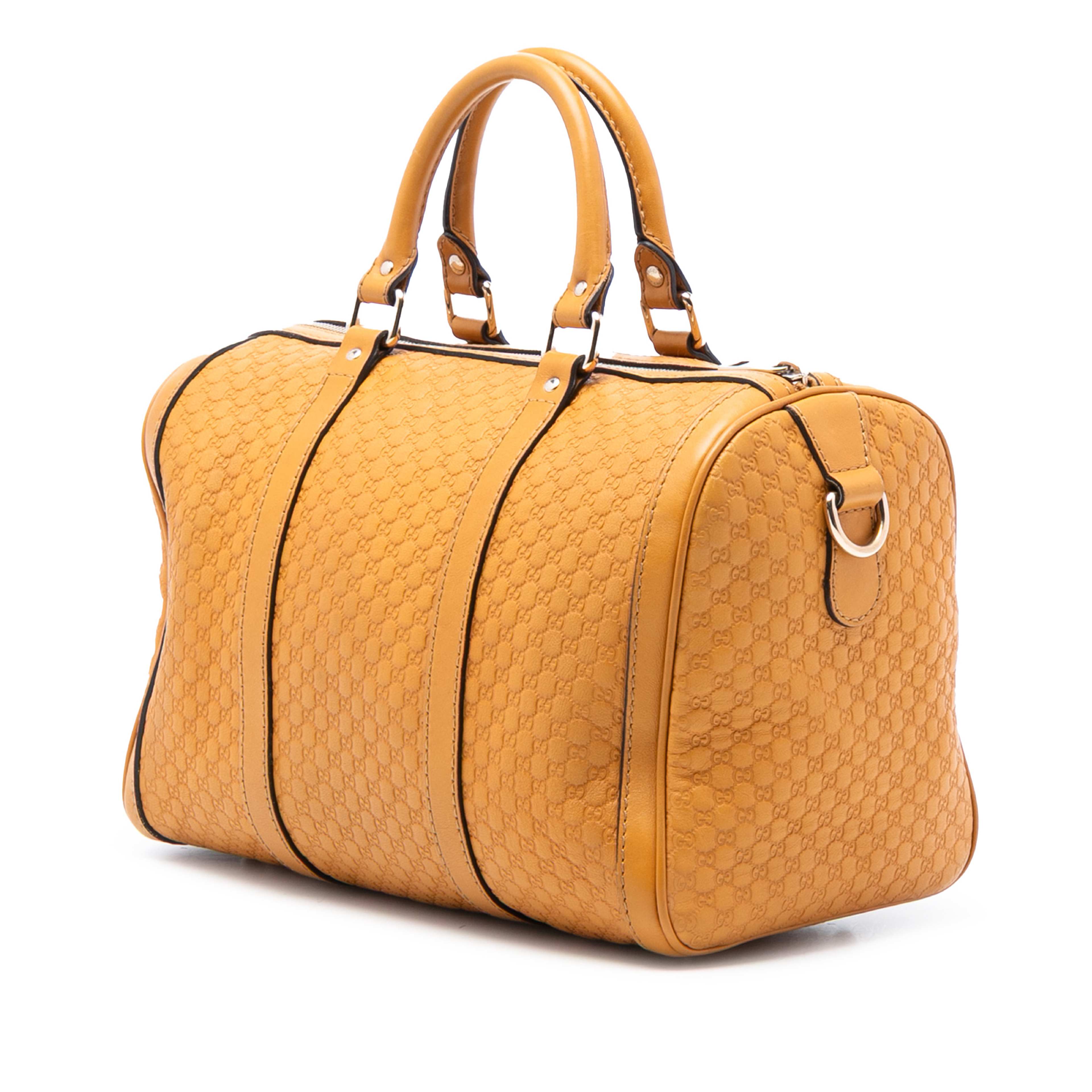 Gucci Medium Microguccissima Joy Boston Bag, från Luxclusif, i färgen mustard. Klicka för att öppna bilden i stort format