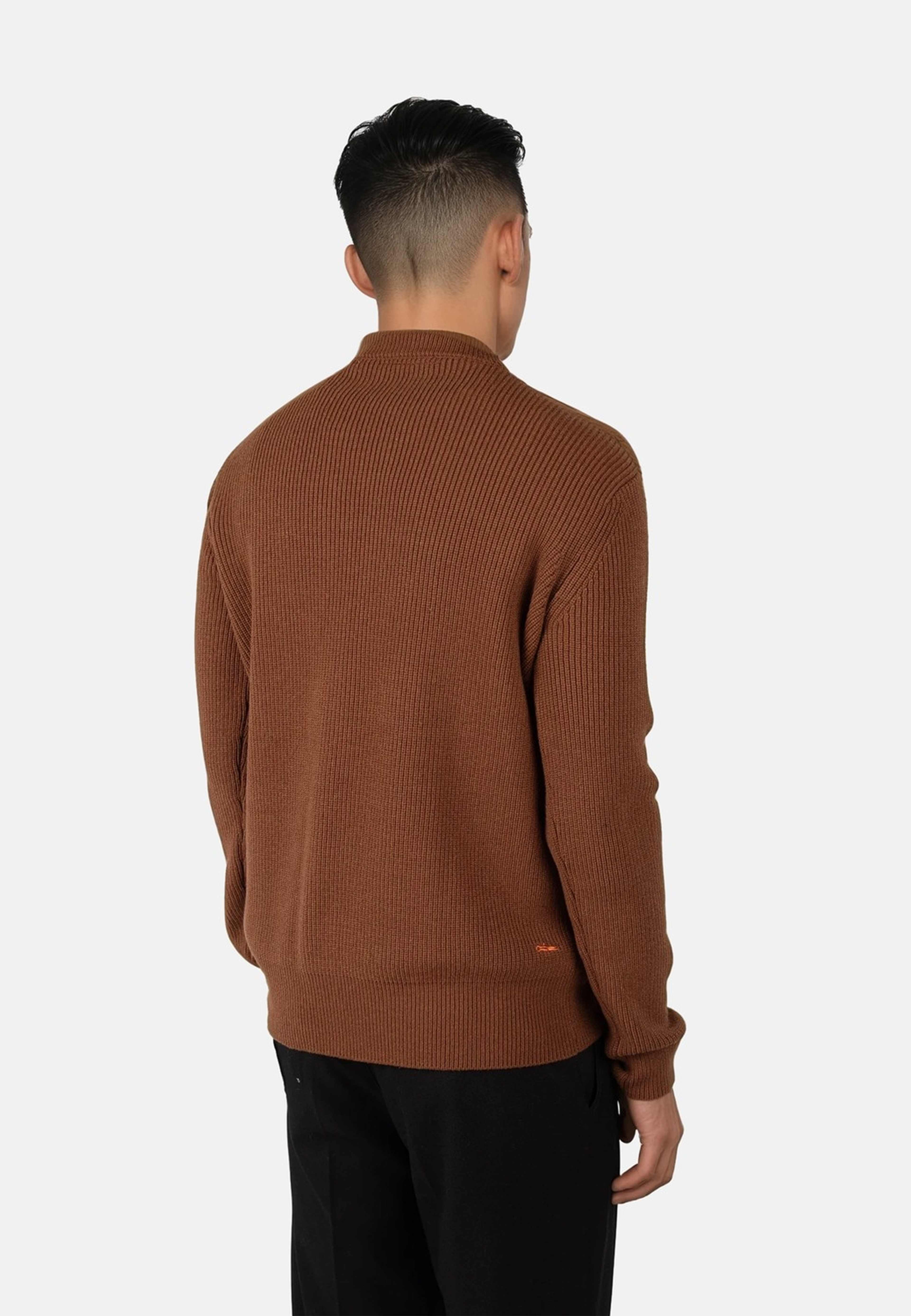 Eddie Knitted Sweater, från Ciszere, i färgen orange. Klicka för att öppna bilden i stort format