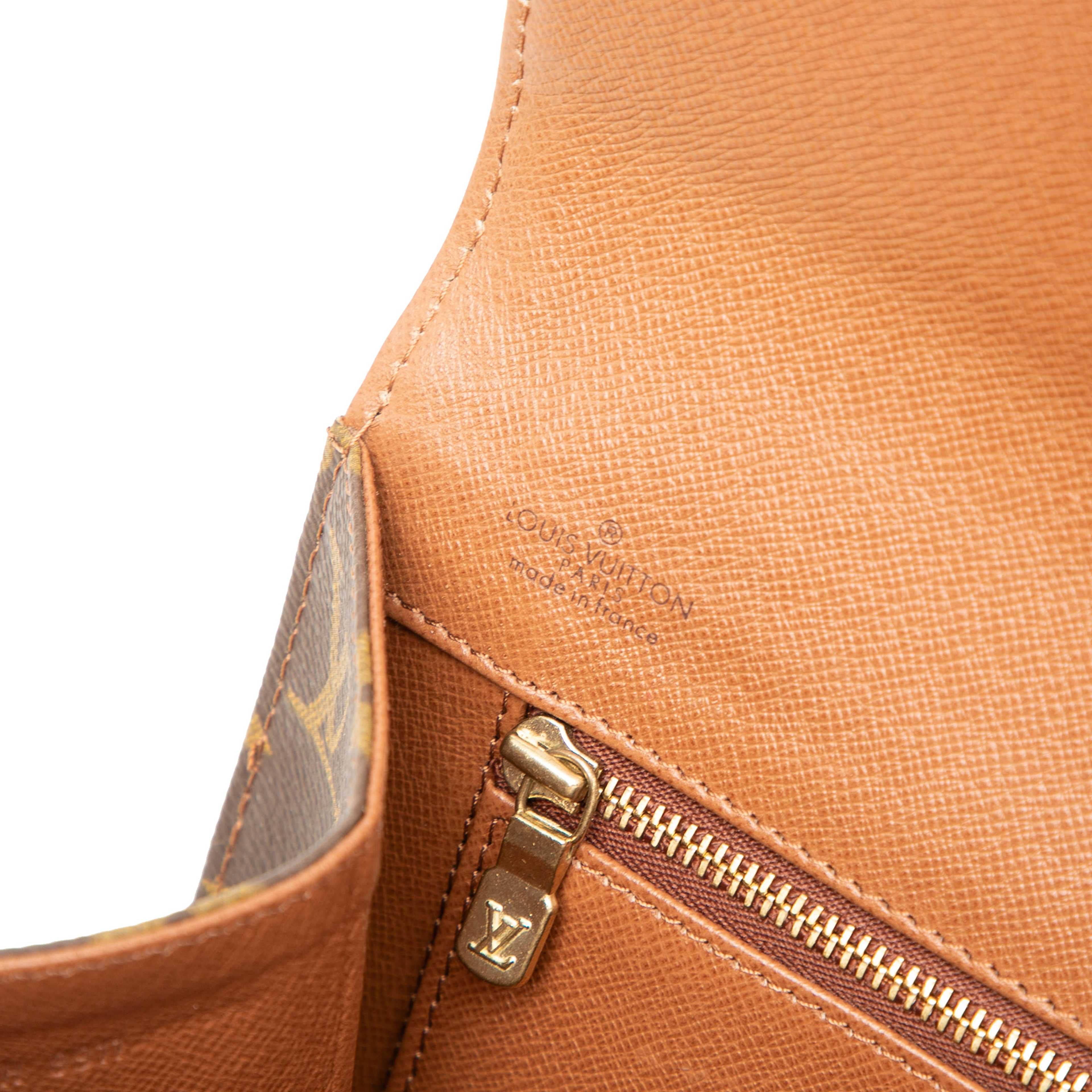 Louis Vuitton Monogram Pochette Dame Pm, från Luxclusif, i färgen brun. Klicka för att öppna bilden i stort format