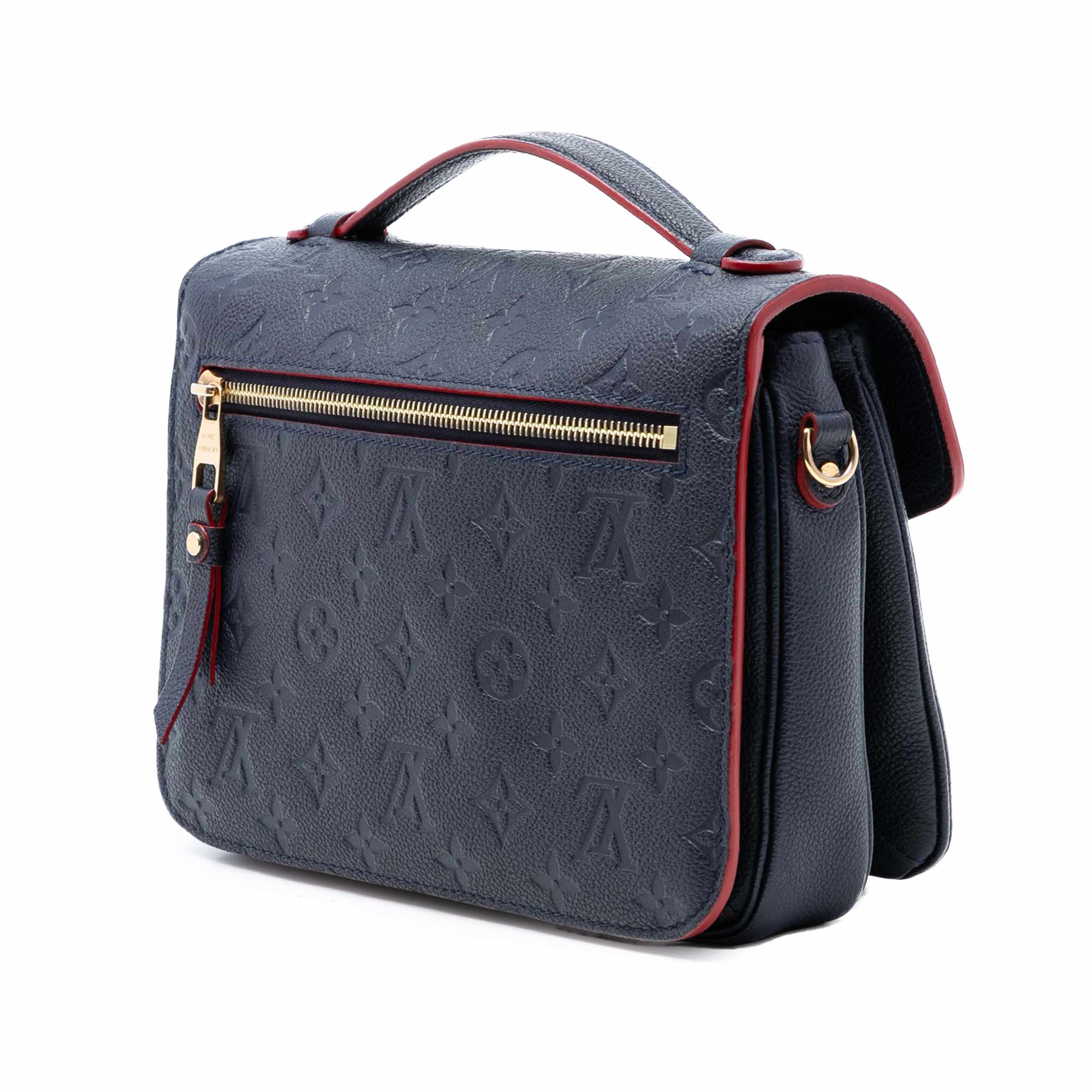 Louis Vuitton Monogram Empreinte Pochette Metis, från Luxclusif, i färgen blå. Klicka för att öppna bilden i stort format