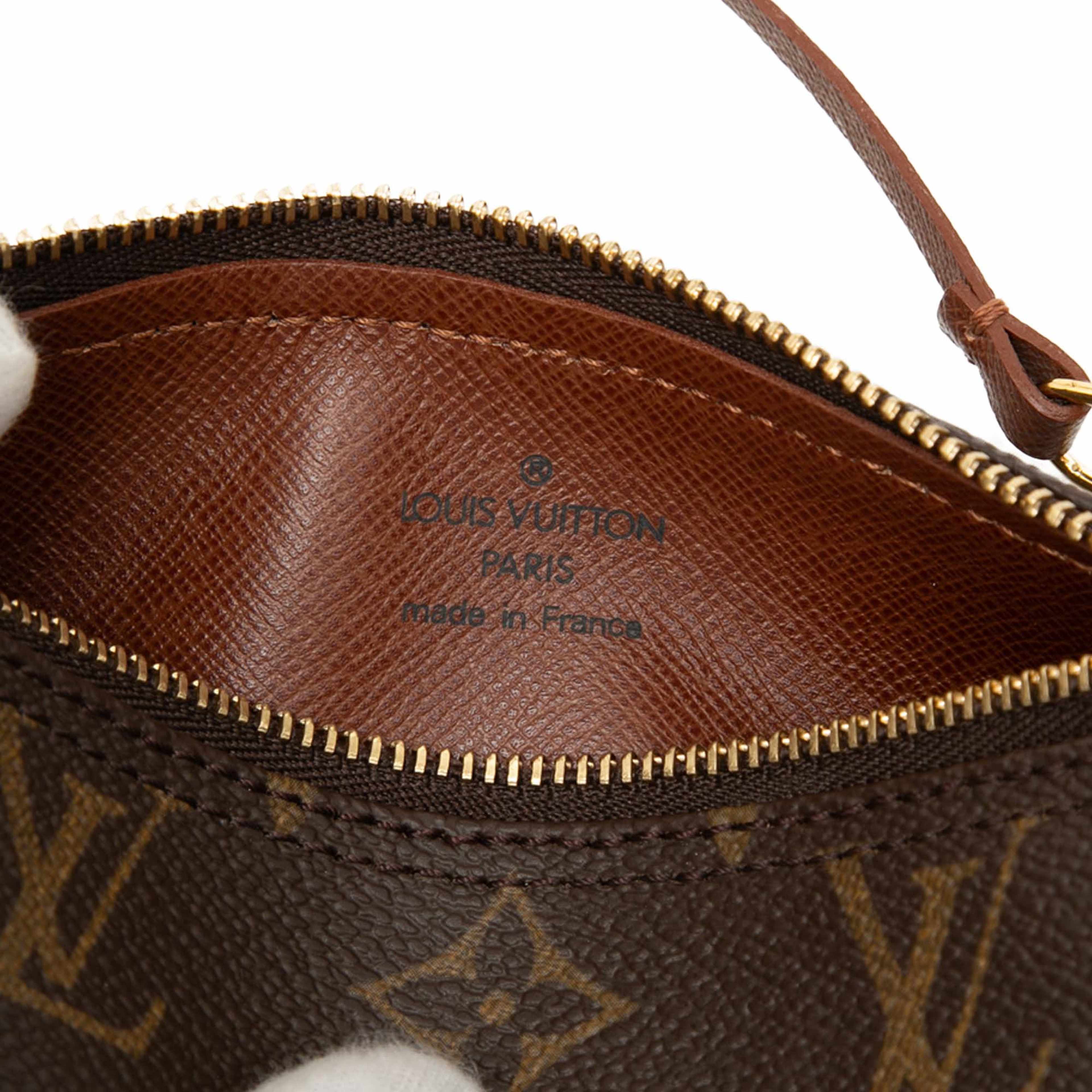 Louis Vuitton Monogram Papillon Pochette, från Luxclusif, i färgen brun. Klicka för att öppna bilden i stort format