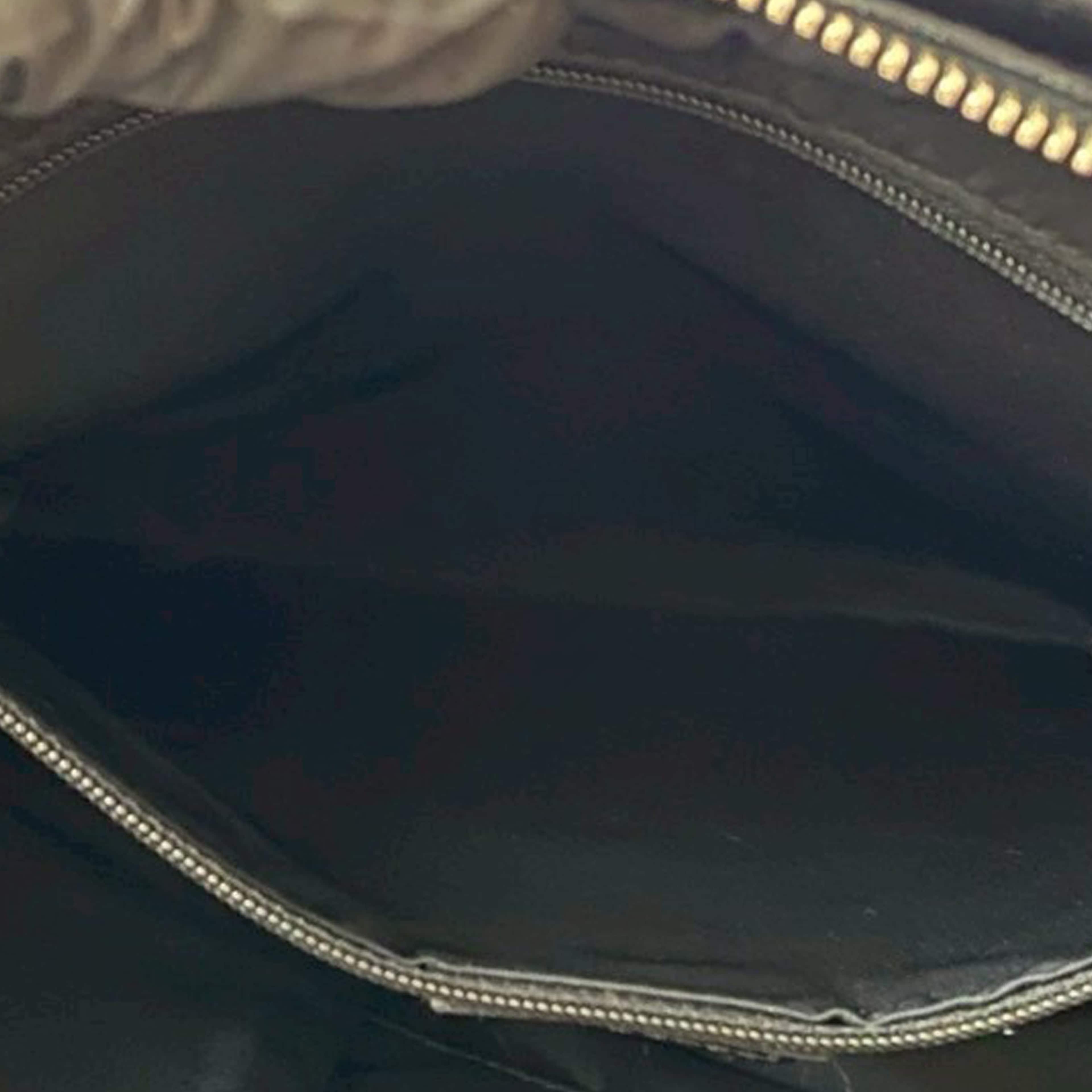 Dior Diorissimo Trotter Canvas Zip Tote, från Luxclusif, i färgen black. Klicka för att öppna bilden i stort format