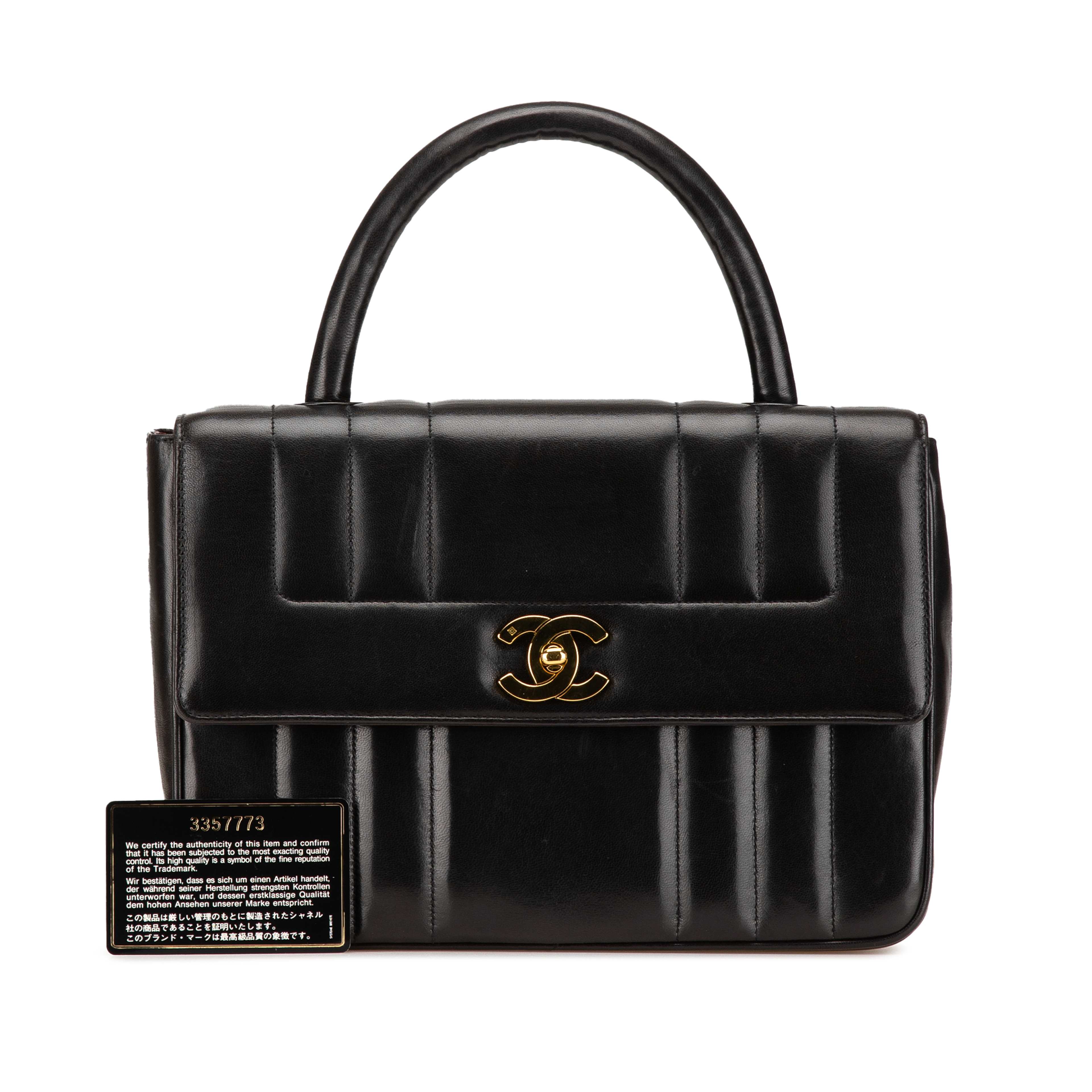 Chanel Mademoiselle Top Handle Handbag, från Luxclusif, i färgen svart. Klicka för att öppna bilden i stort format