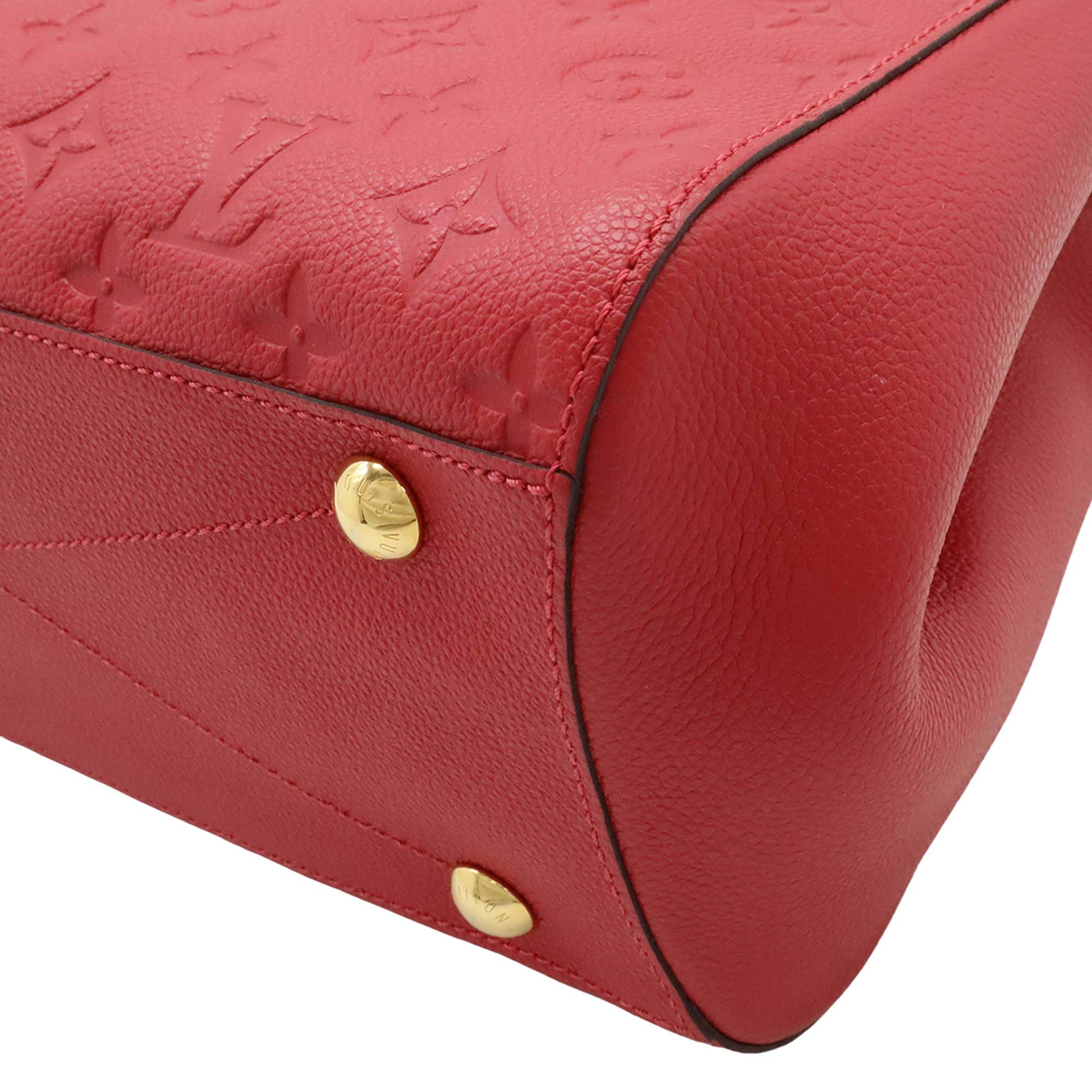 Louis Vuitton Monogram Empreinte Montaigne Mm, från Luxclusif, i färgen röd. Klicka för att öppna bilden i stort format