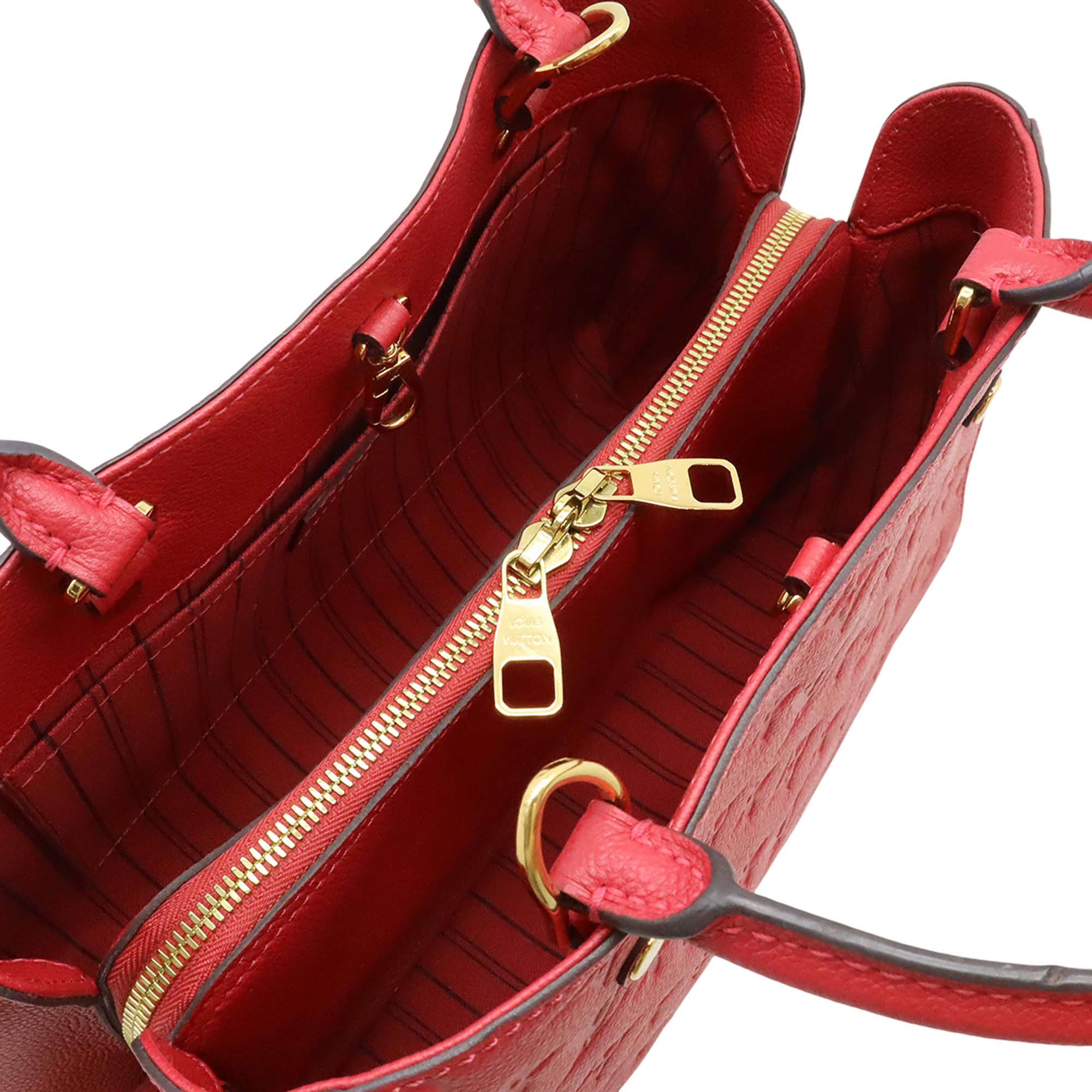 Louis Vuitton Monogram Empreinte Montaigne Mm, från Luxclusif, i färgen röd. Klicka för att öppna bilden i stort format