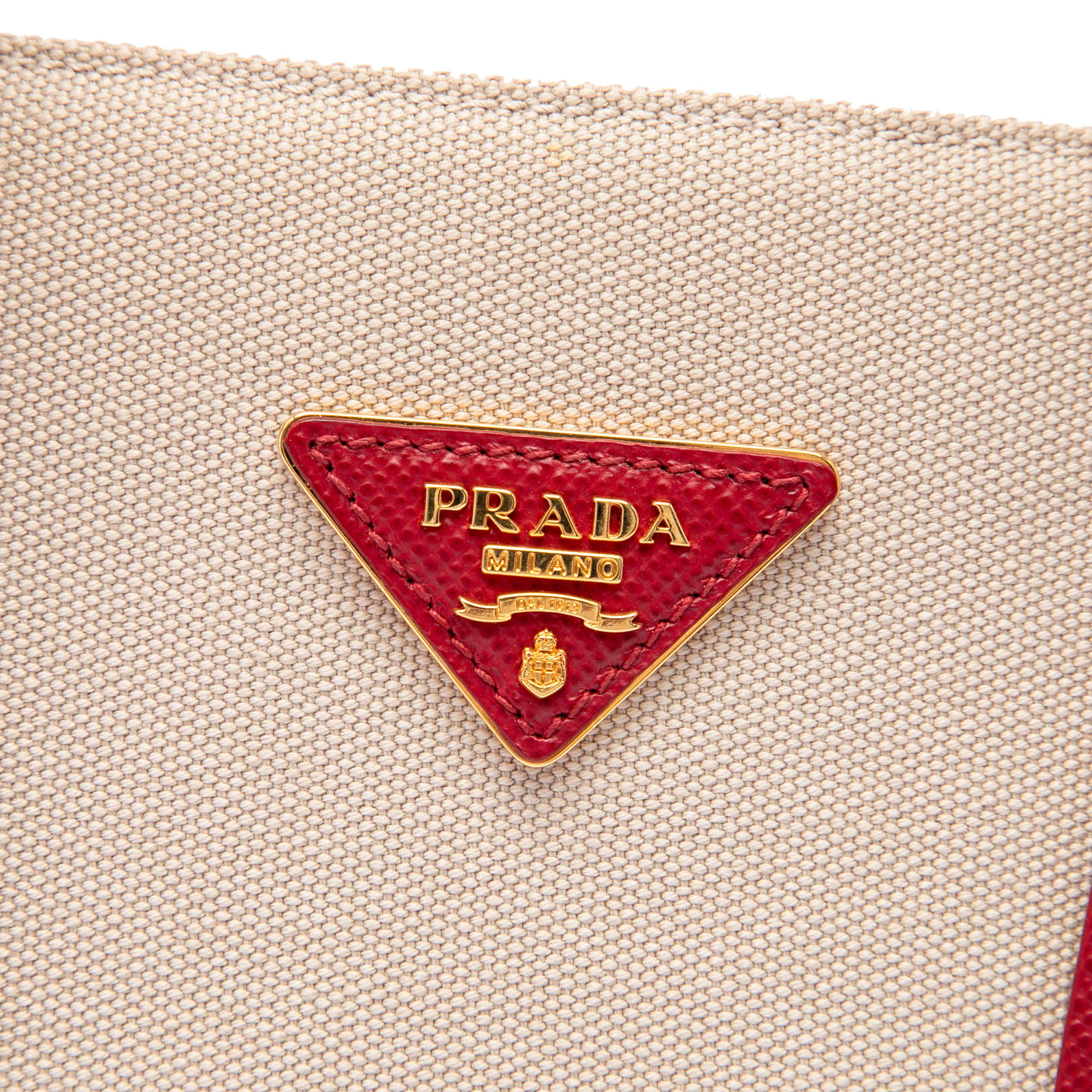 Prada Large Saffiano Trimmed Canapa Double Satchel, från Luxclusif, i färgen beige. Klicka för att öppna bilden i stort format