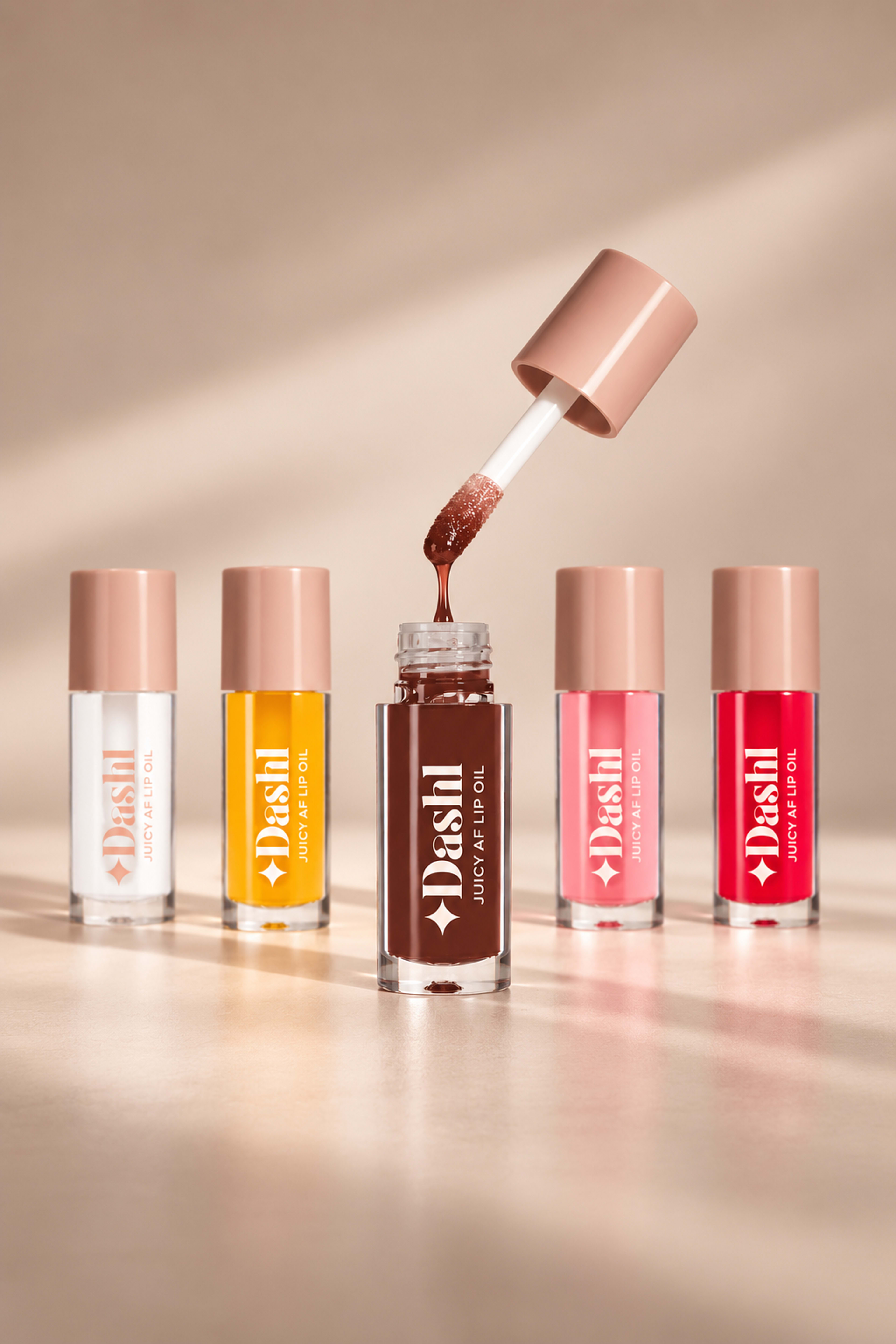 Juicy AF Lip Oil - Choco Glaze, från DASHL, i färgen Choco Glaze. Klicka för att öppna bilden i stort format