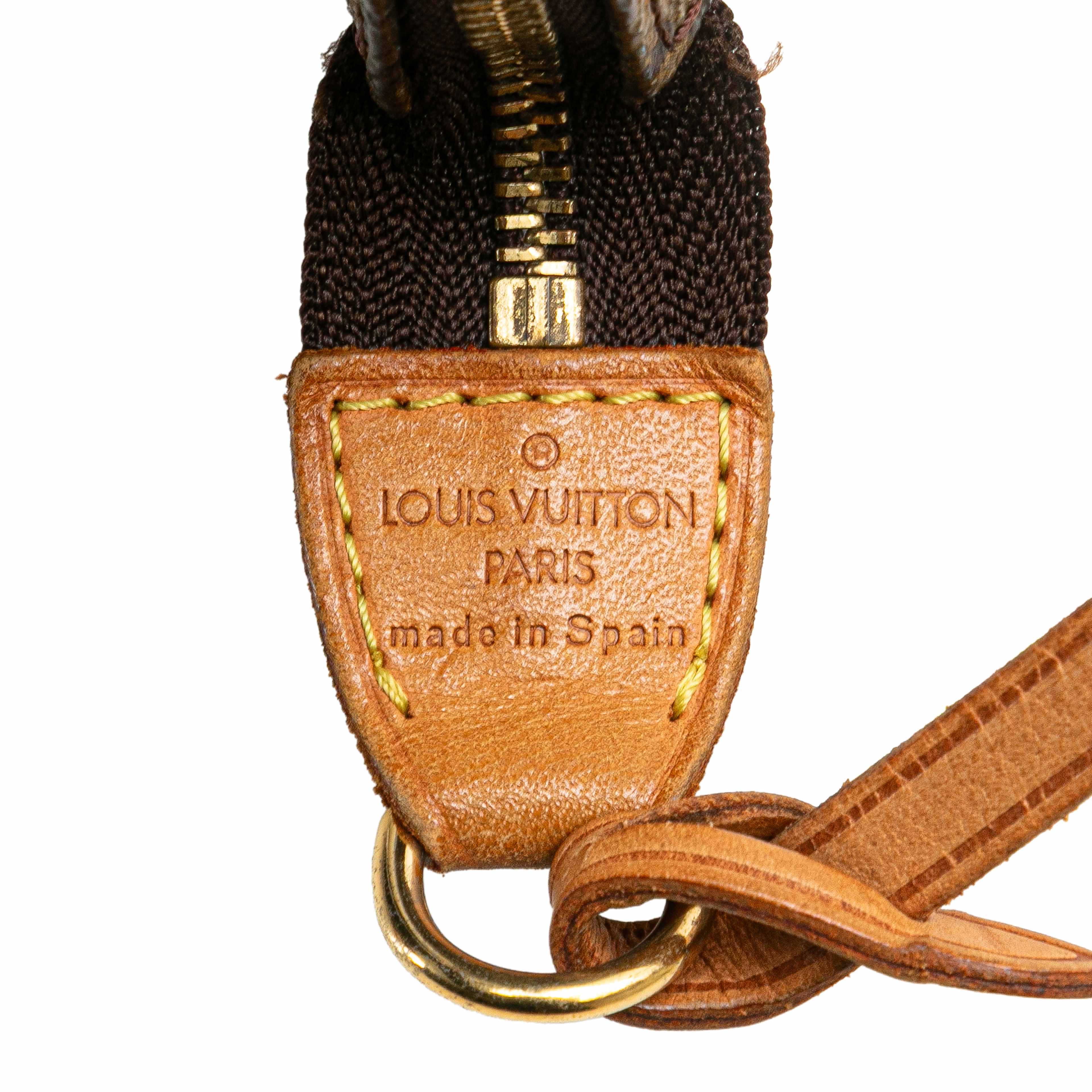 Louis Vuitton Monogram Pochette Accessoires, från Luxclusif, i färgen brown. Klicka för att öppna bilden i stort format