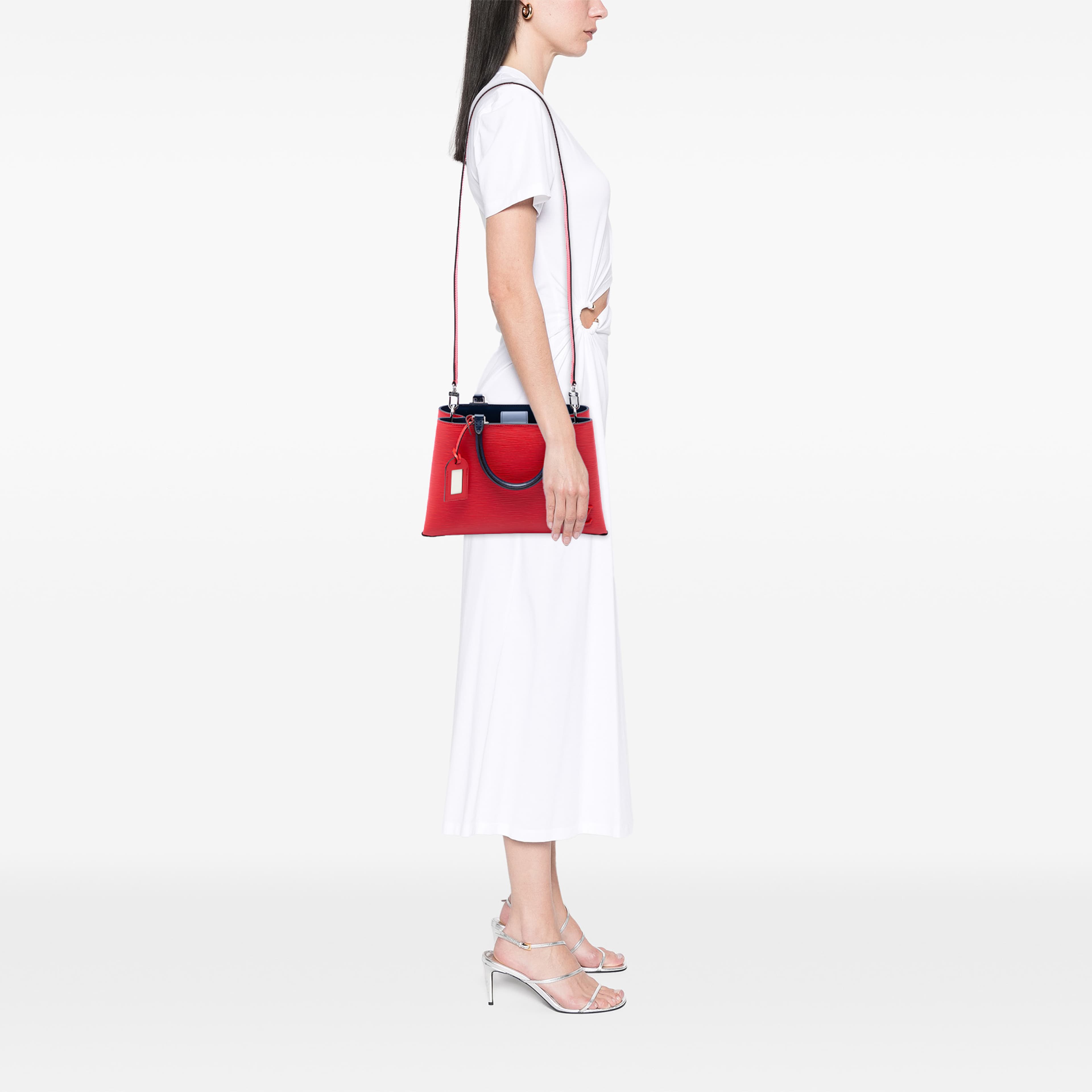 Louis Vuitton Epi Kleber Pm, från Luxclusif, i färgen röd. Klicka för att öppna bilden i stort format