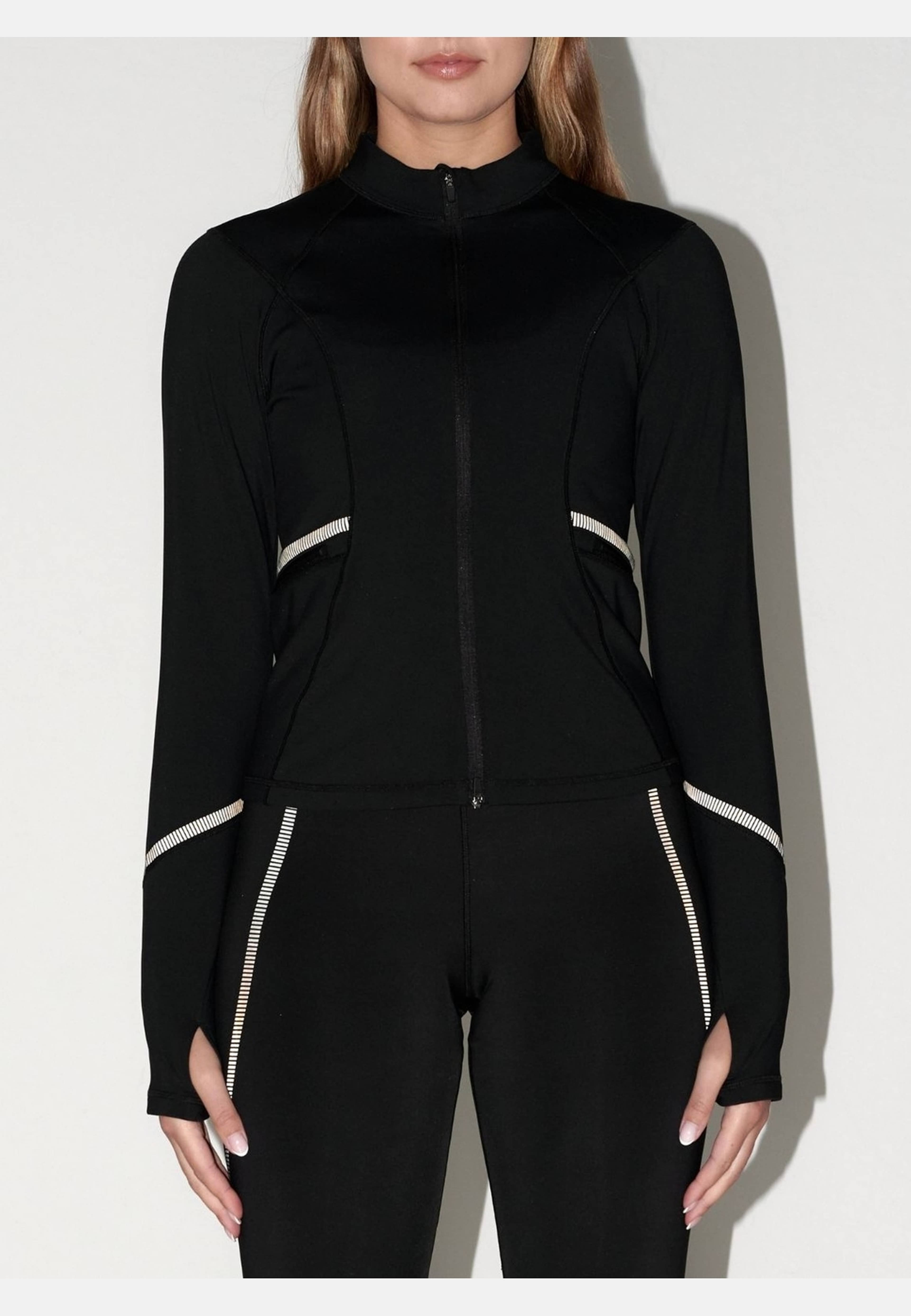 Reflective Warming Zip Jacket, från aim'n, i färgen black. Klicka för att öppna bilden i stort format