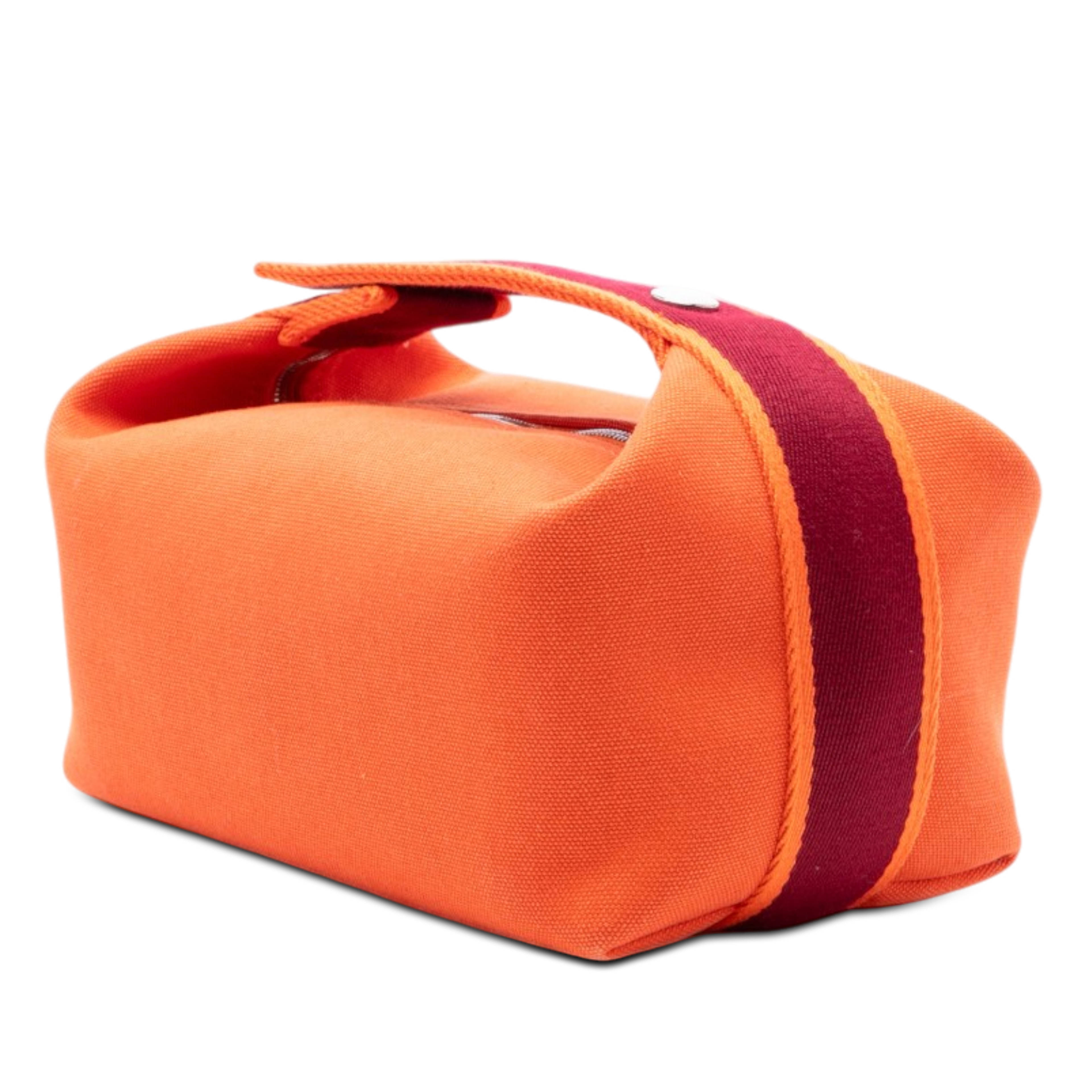 Hermès Small Toile Bride A Brac Case, från Luxclusif, i färgen orange. Klicka för att öppna bilden i stort format