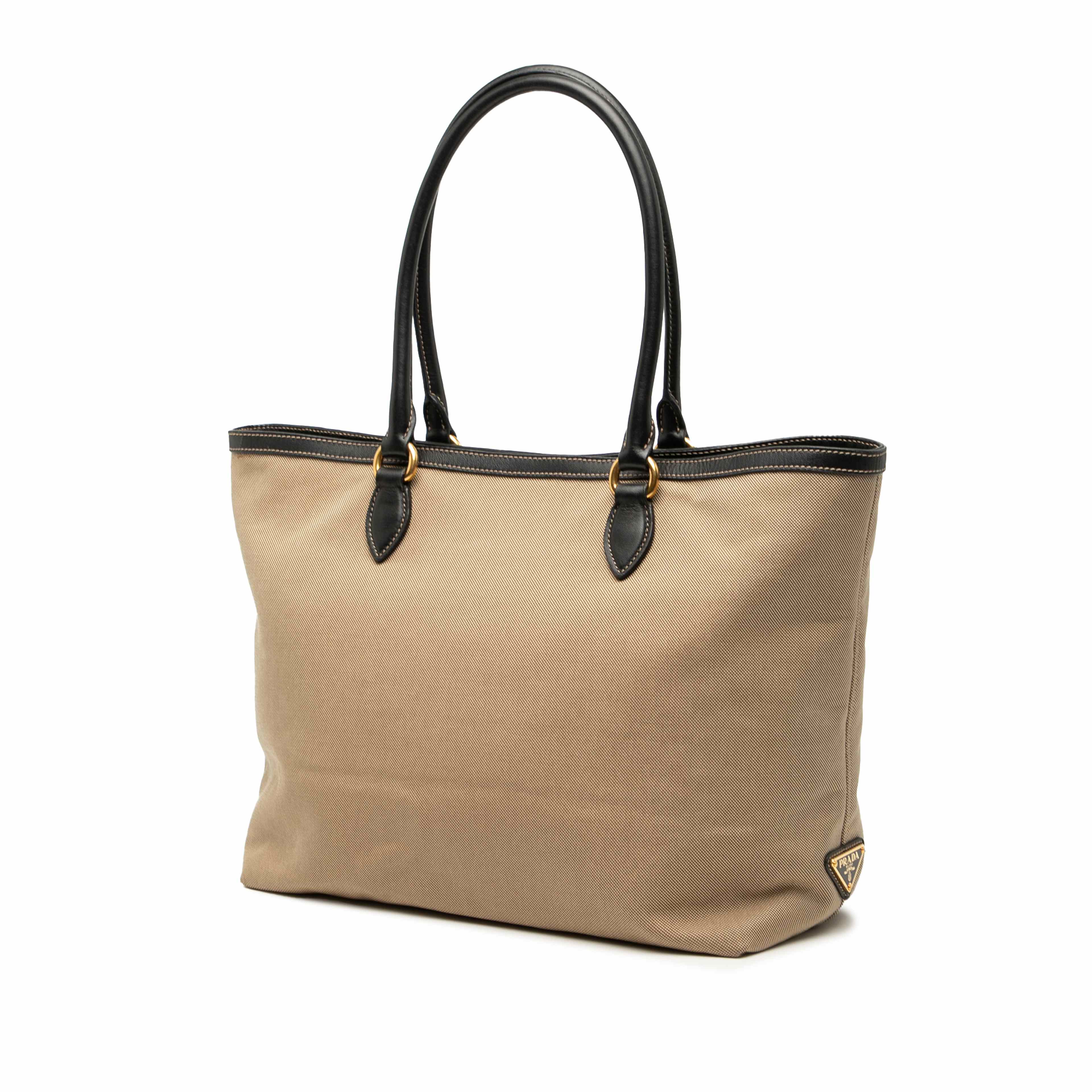 Prada Canvas Canapa Logo Tote, från Luxclusif, i färgen beige. Klicka för att öppna bilden i stort format