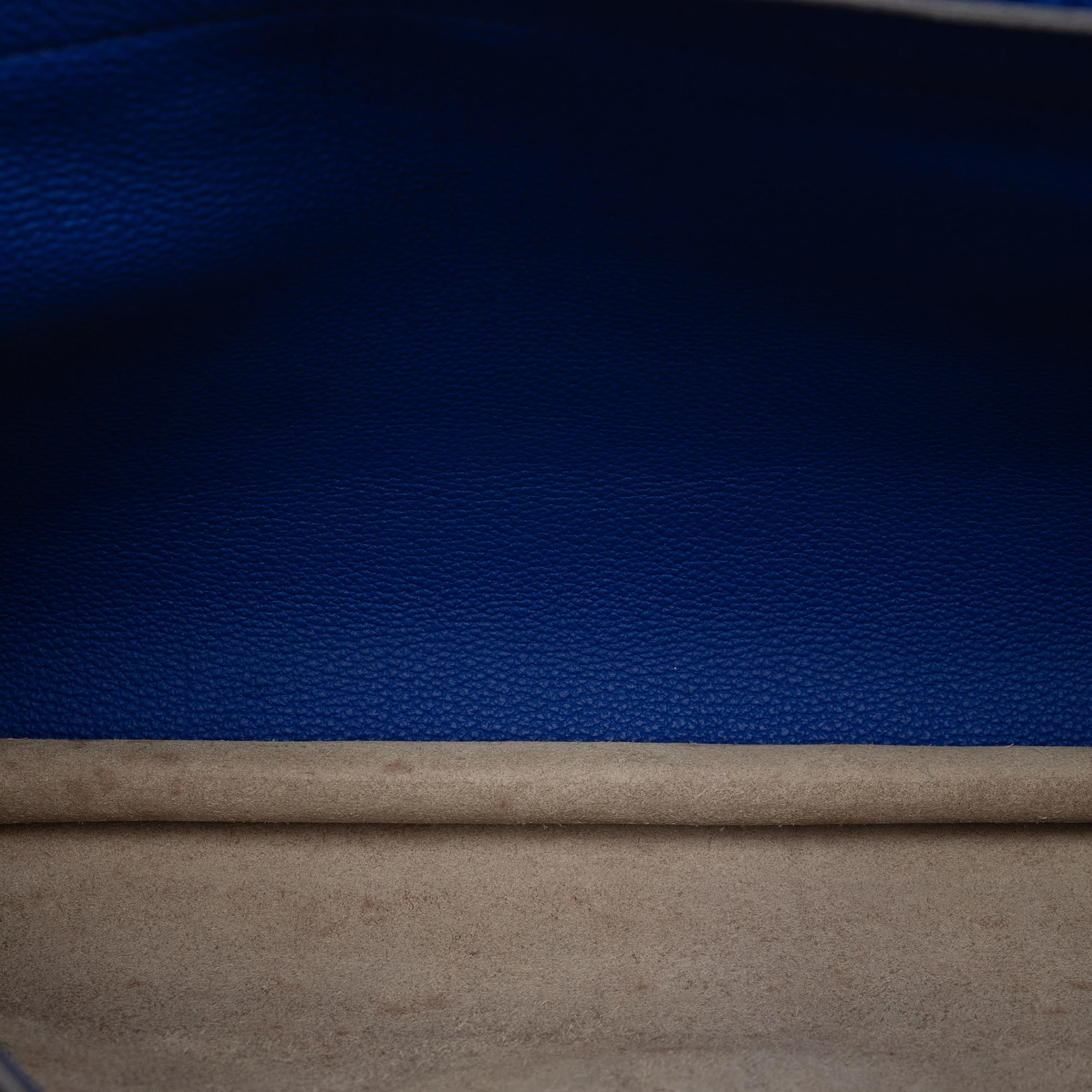 Hermès Togo Verso Sac A Depeches 38, från Luxclusif, i färgen dark brown. Klicka för att öppna bilden i stort format