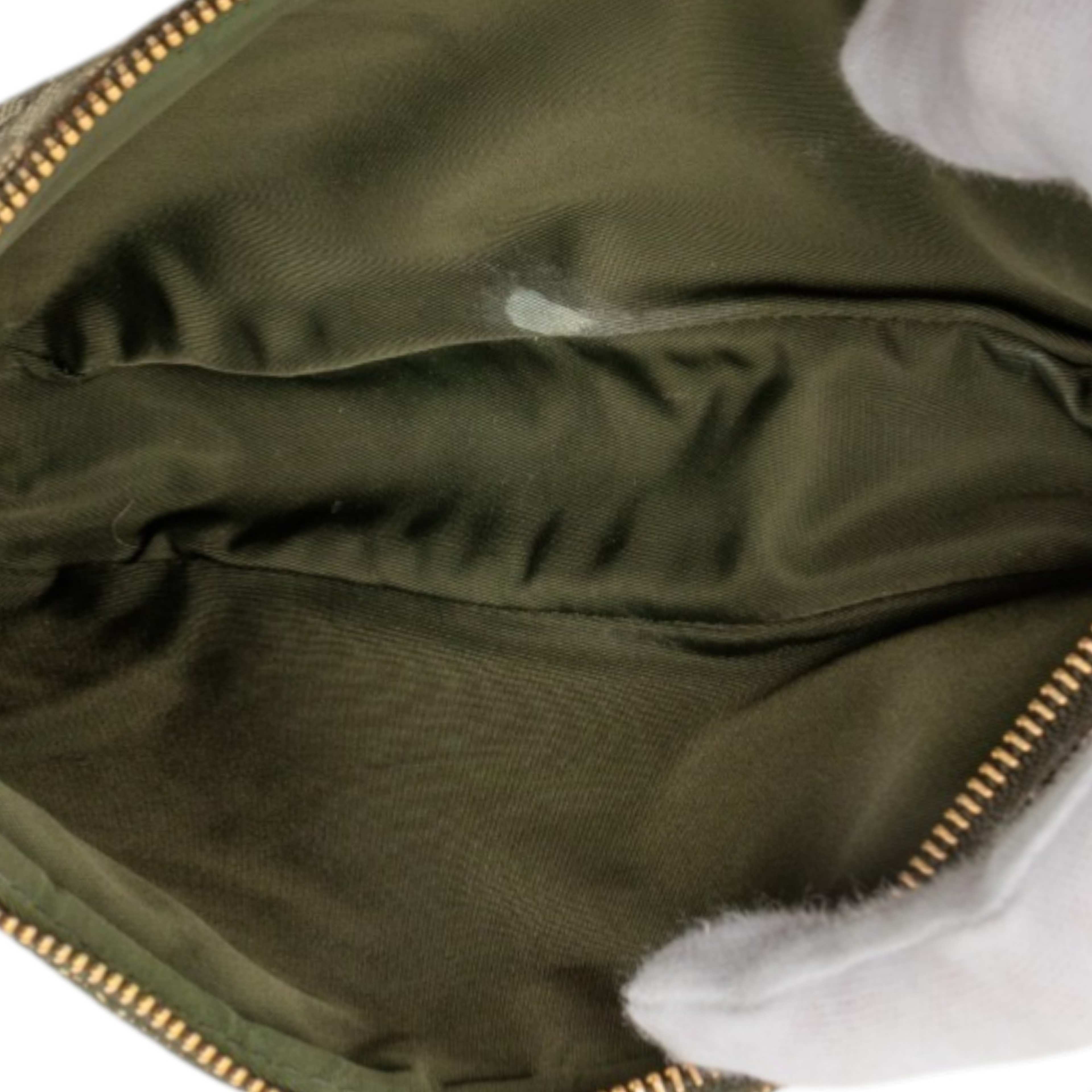 Dior Mini Diorissimo Canvas Saddle Pochette, från Luxclusif, i färgen green. Klicka för att öppna bilden i stort format