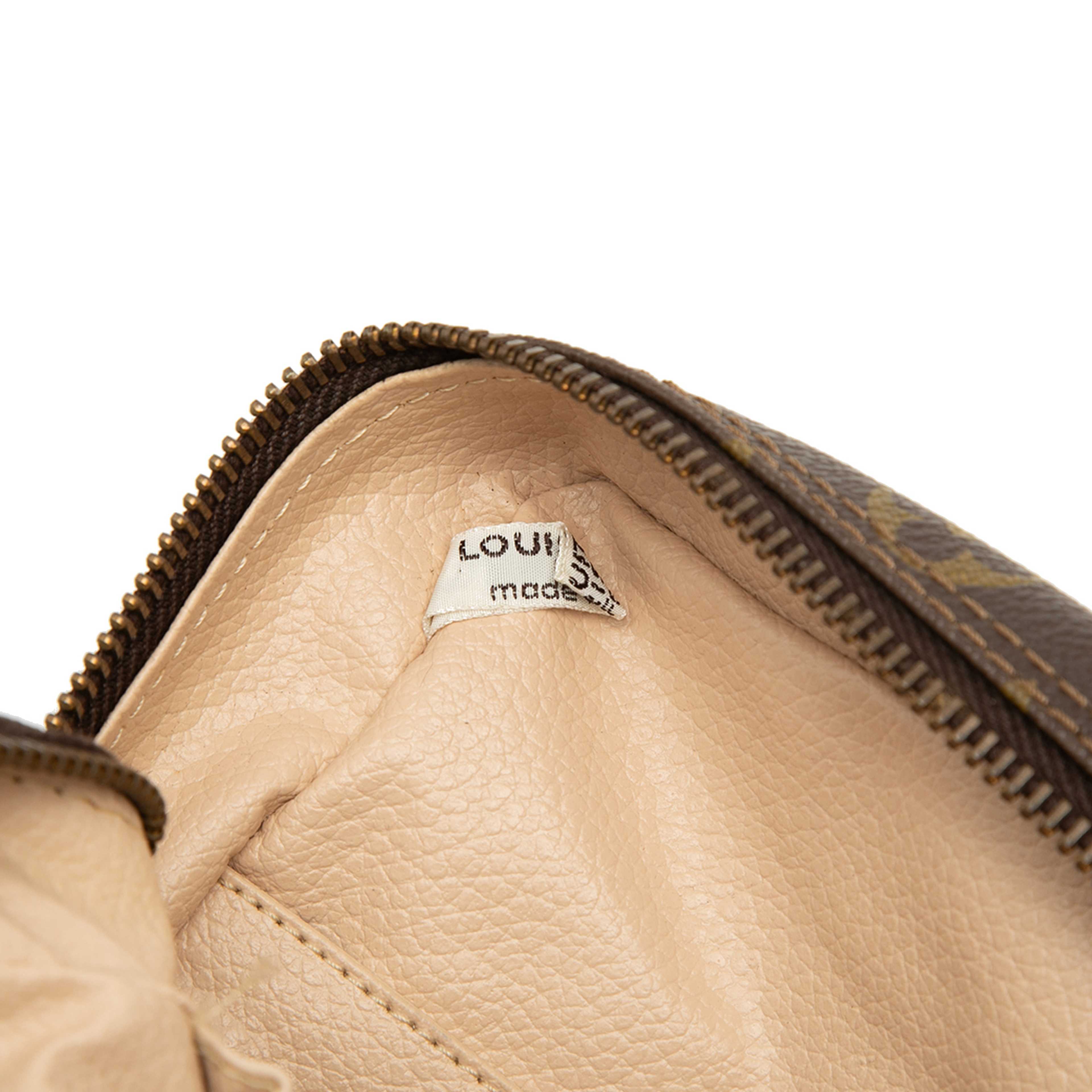 Louis Vuitton Monogram Trousse Toilette 28, från Luxclusif, i färgen brown. Klicka för att öppna bilden i stort format