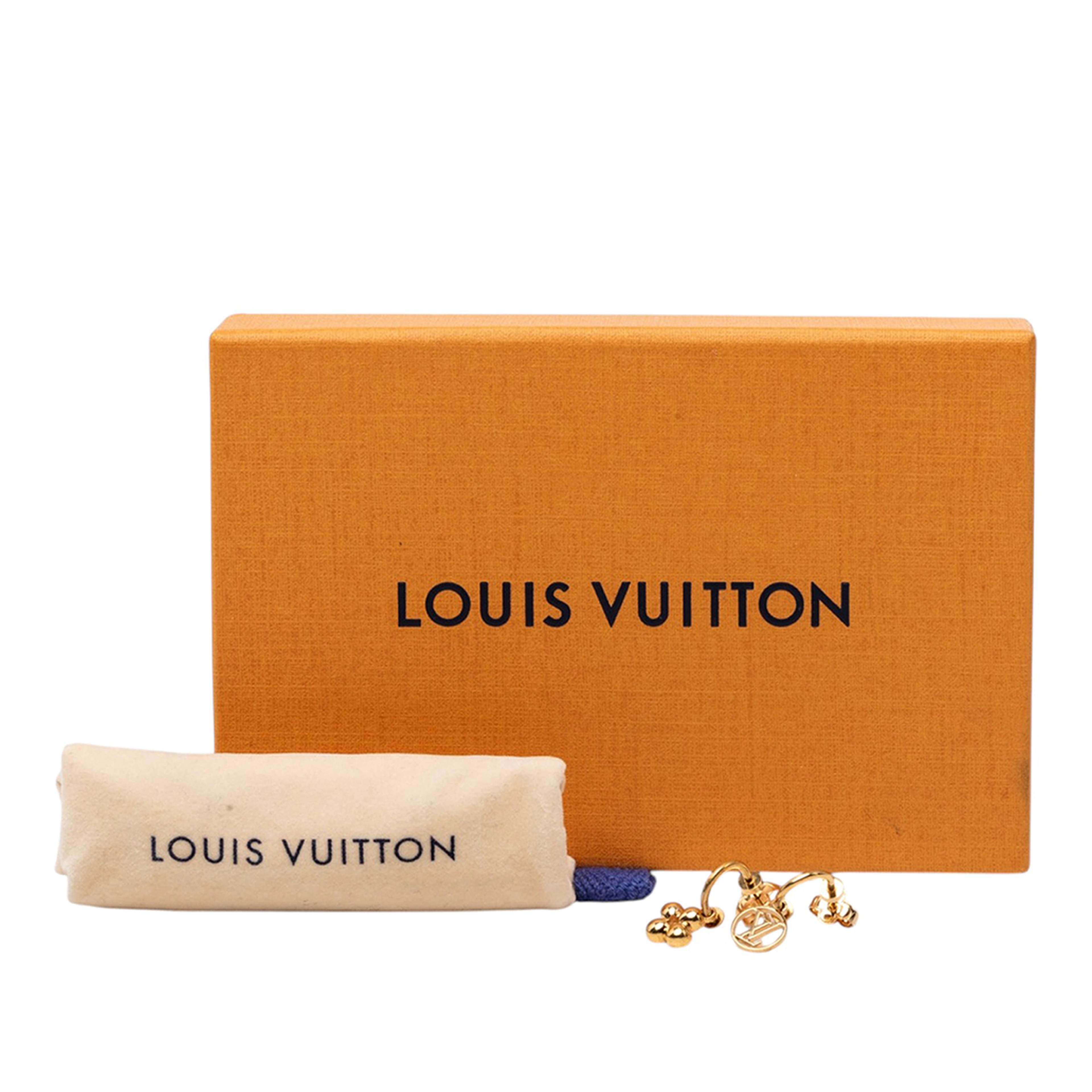 Louis Vuitton Monogram Papillon Pochette, från Luxclusif, i färgen guld. Klicka för att öppna bilden i stort format