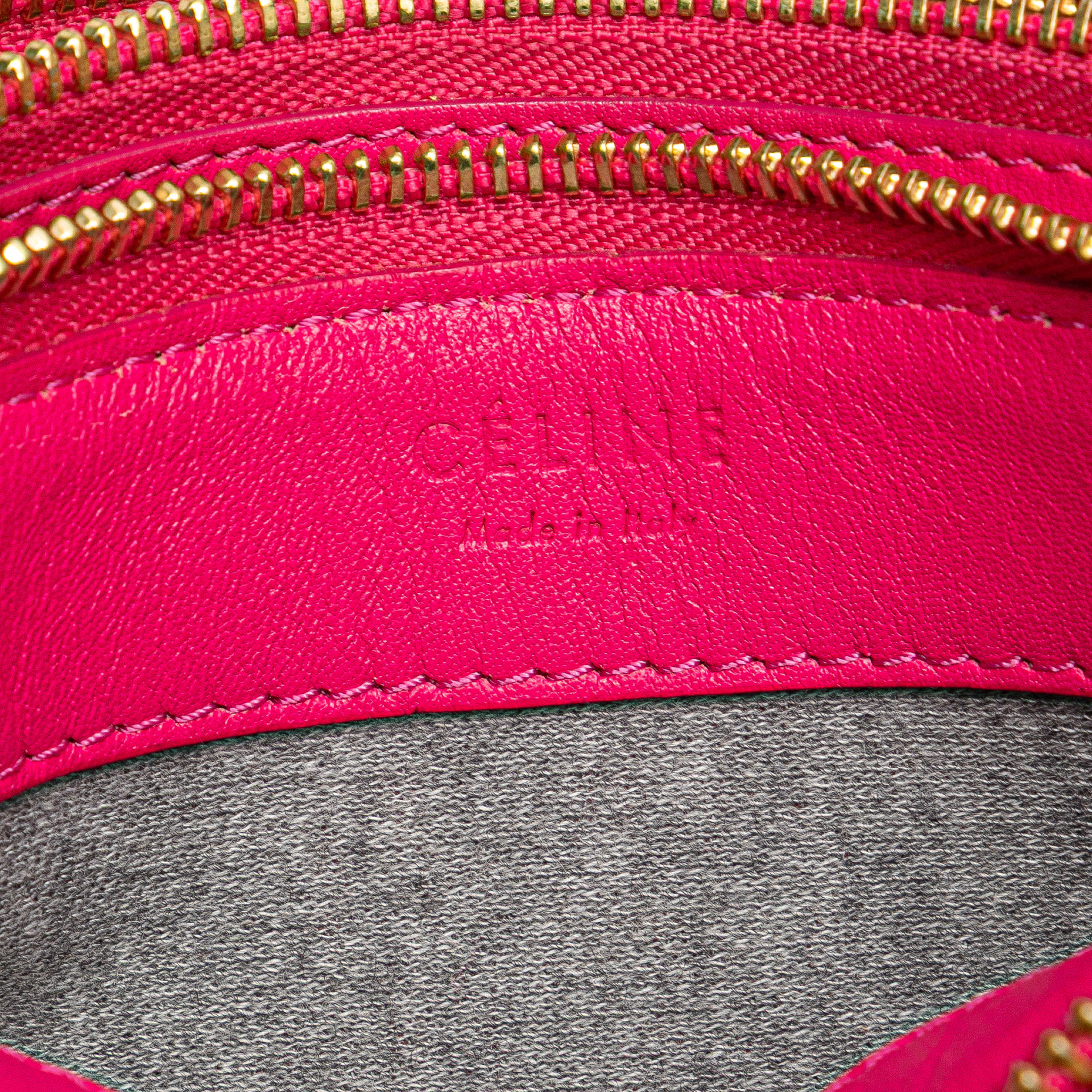 Celine Small Lambskin Trio Crossbody, från Luxclusif, i färgen hot pink. Klicka för att öppna bilden i stort format